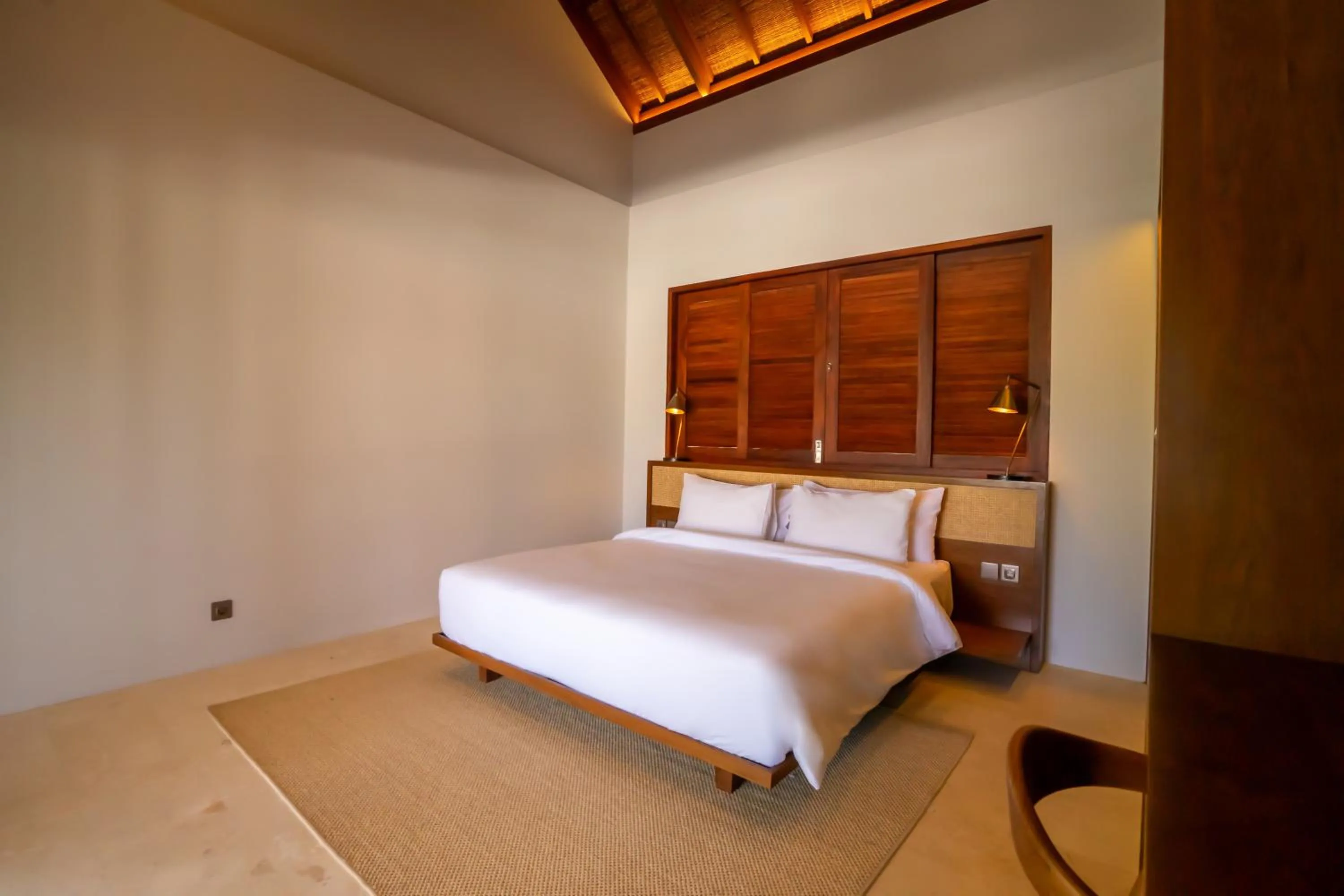 Bed in Amarta Beach Retreat by Nakula