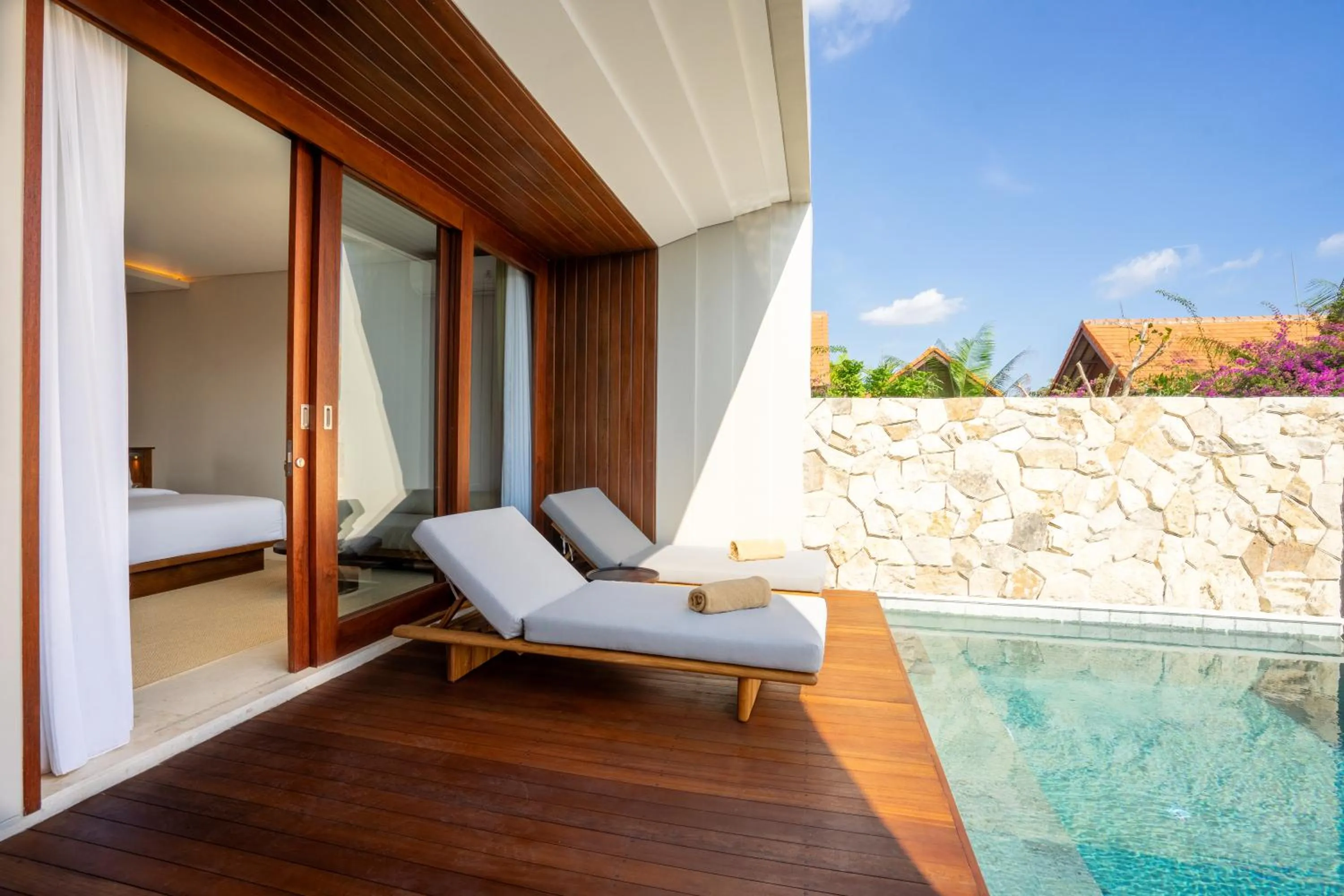 Swimming pool in Amarta Beach Retreat by Nakula