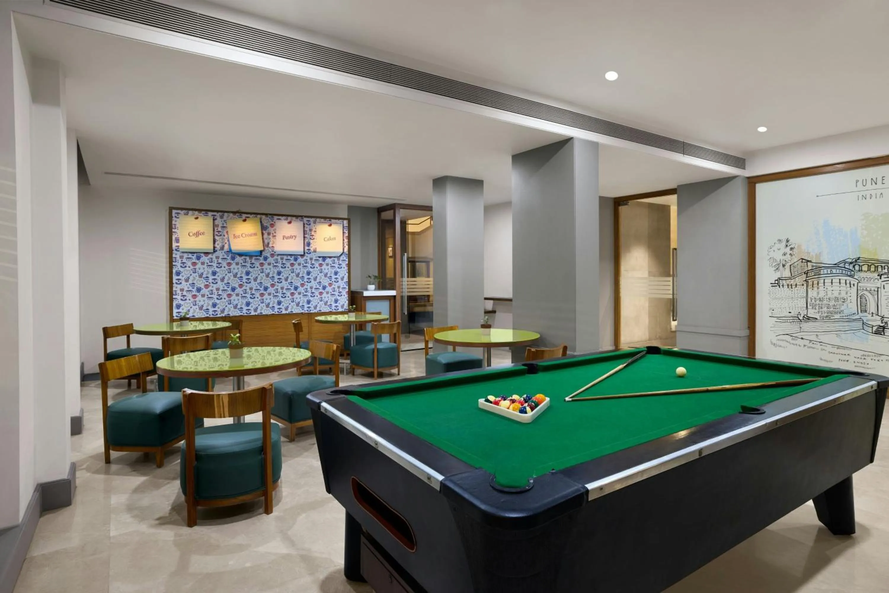 Swimming pool in The Fern Residency Woodland, Pune, Series by Marriott