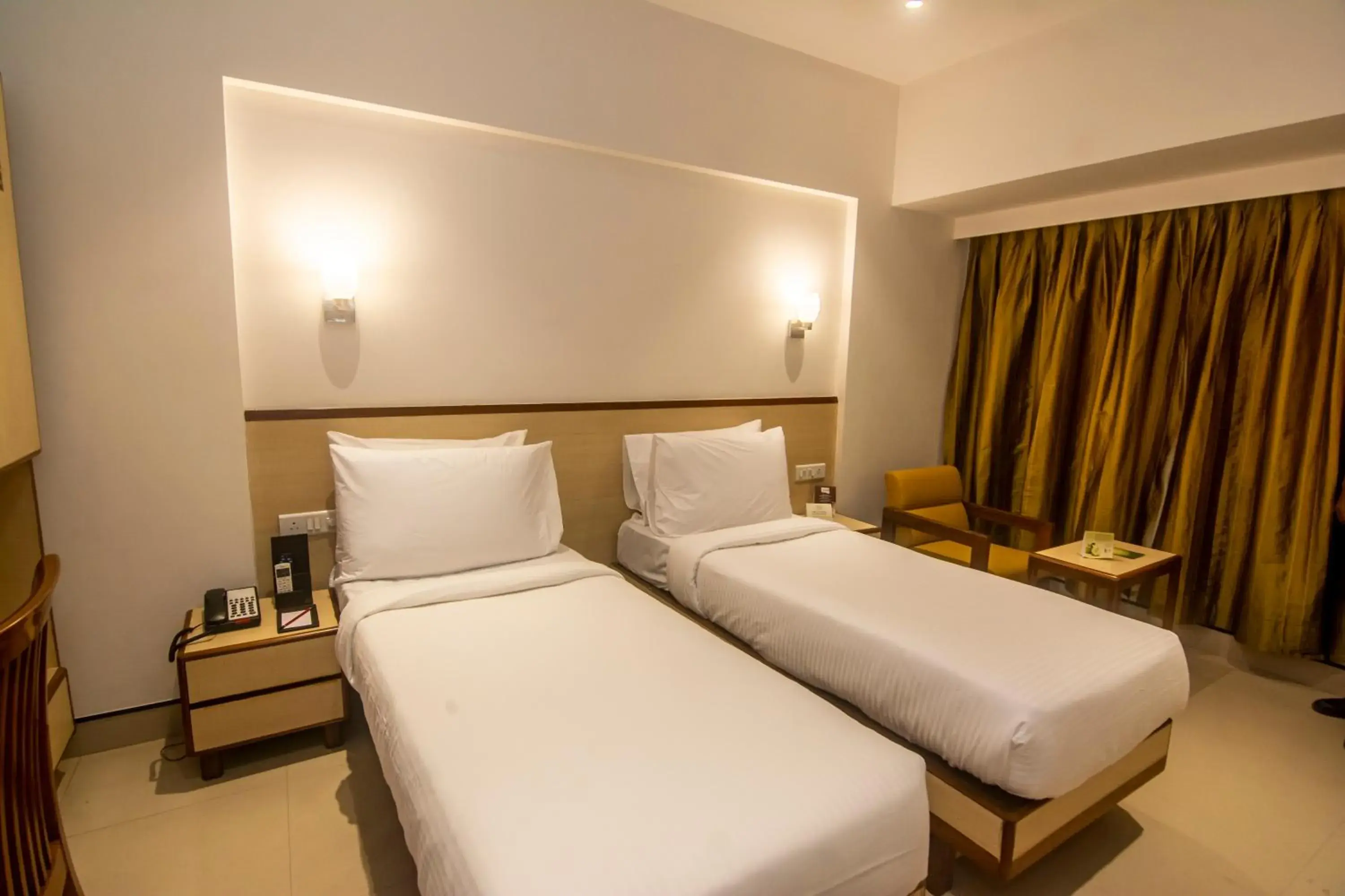 Winter Green Room, 2 Twin Beds - single occupancy in The Fern Residency Woodland, Pune, Series by Marriott Winter Green Room, 2 Twin Beds - single occupancy in The Fern Residency Woodland, Pune, Series by Marriott