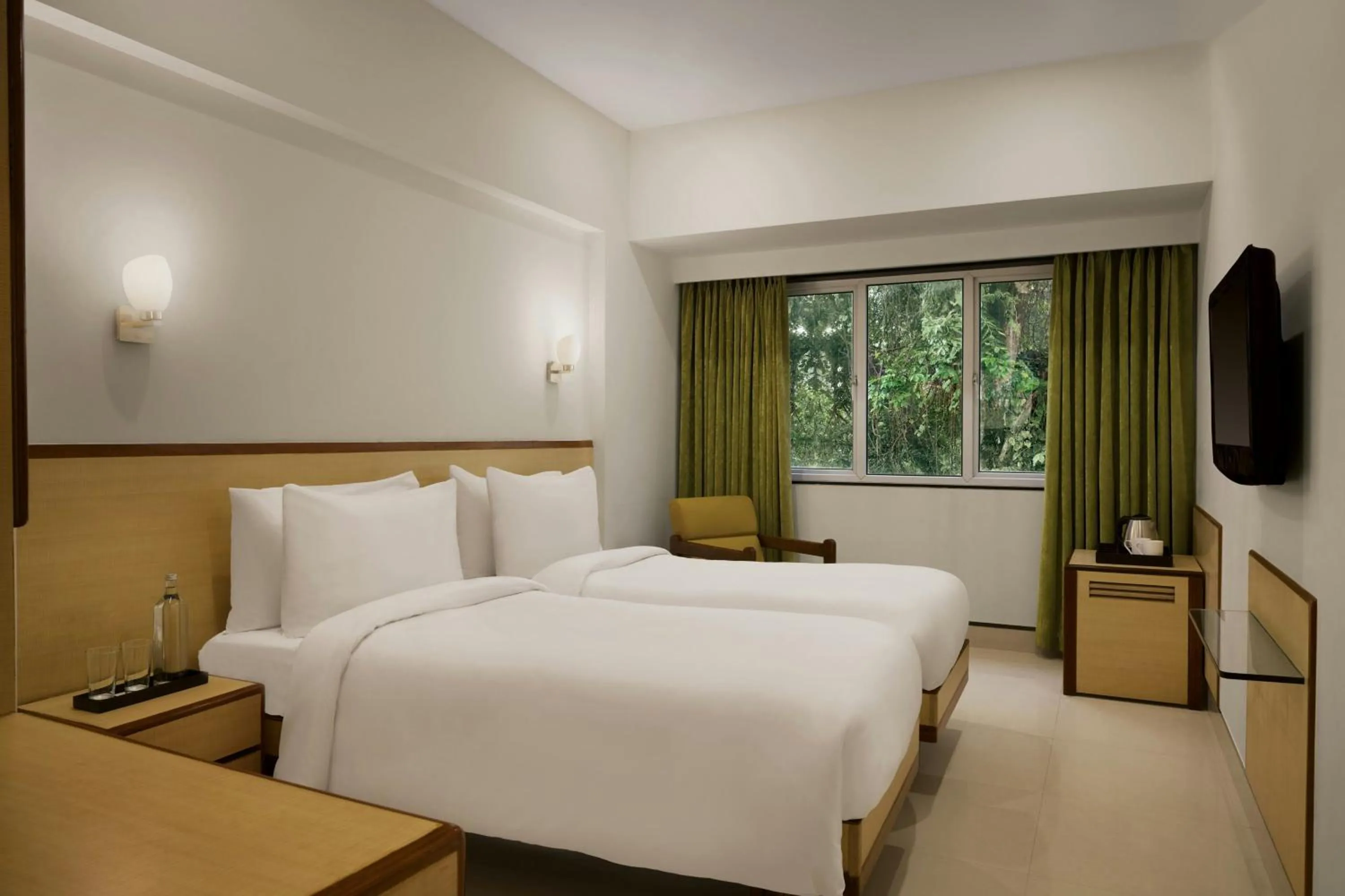 Photo of the whole room, Bed in The Fern Residency Woodland, Pune, Series by Marriott