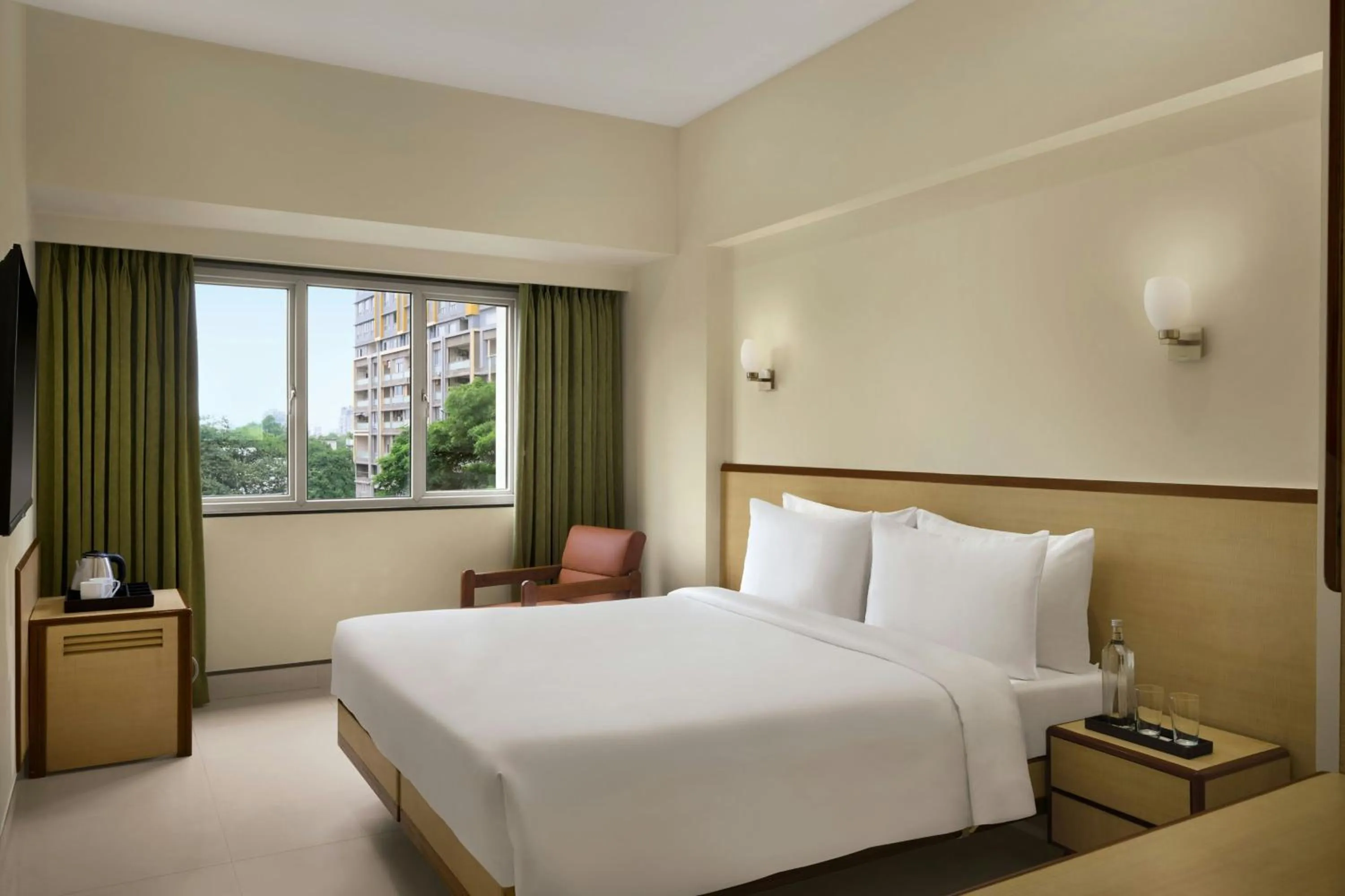 Photo of the whole room, Bed in The Fern Residency Woodland, Pune, Series by Marriott