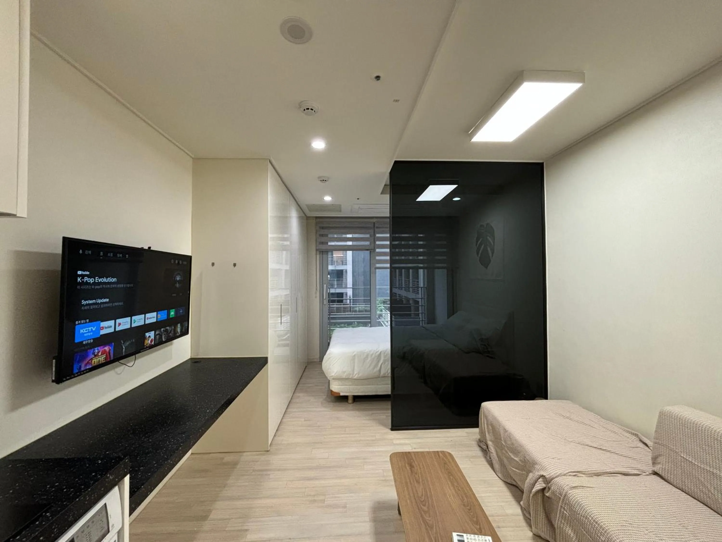 Photo of the whole room, Bed in The Hide City