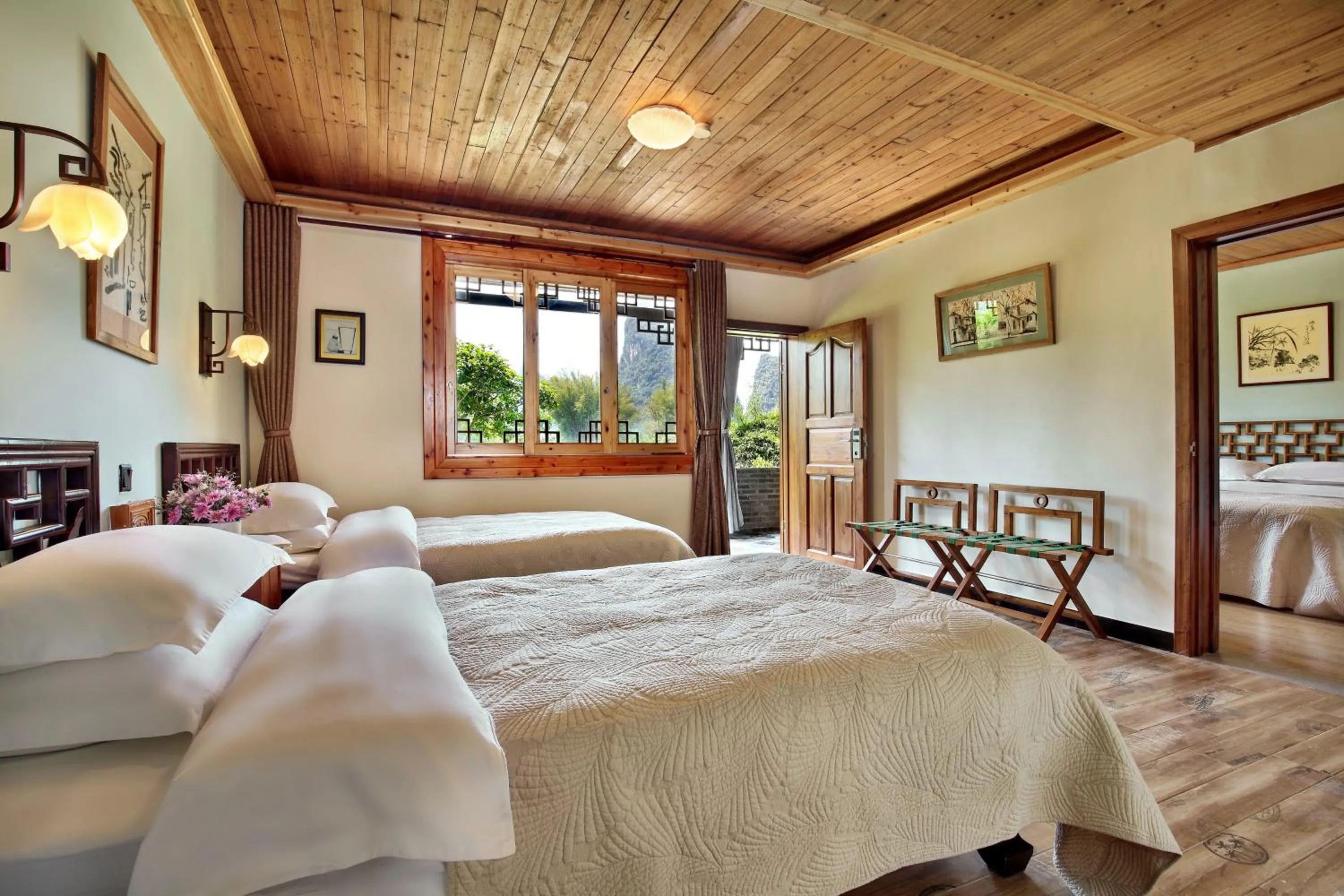 Photo of the whole room, Bed in Yangshuo Mountain Retreat