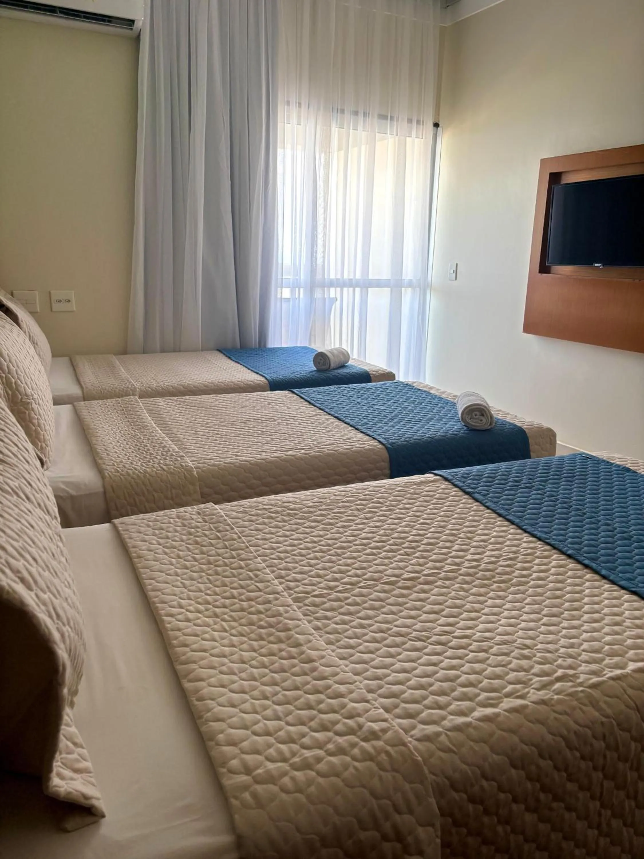 Bed in Royal Urban Macaé Hotel