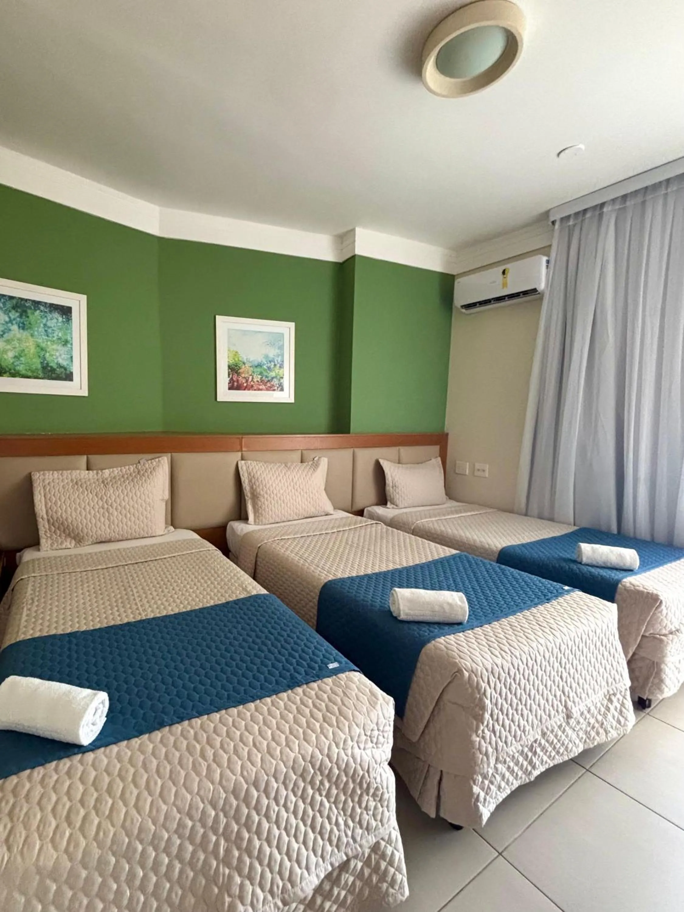 Bed in Royal Urban Macaé Hotel