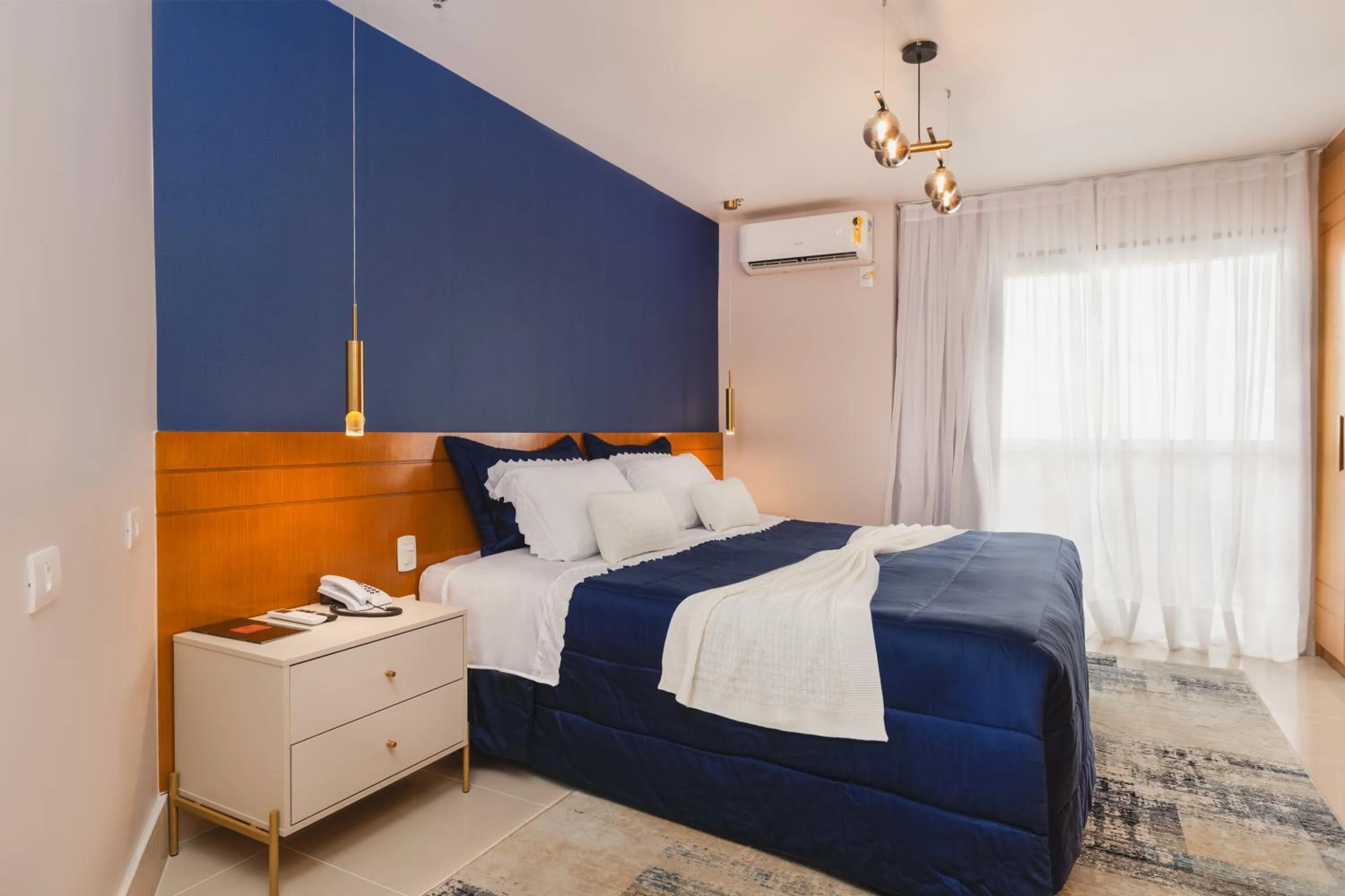 Bed in Royal Urban Macaé Hotel