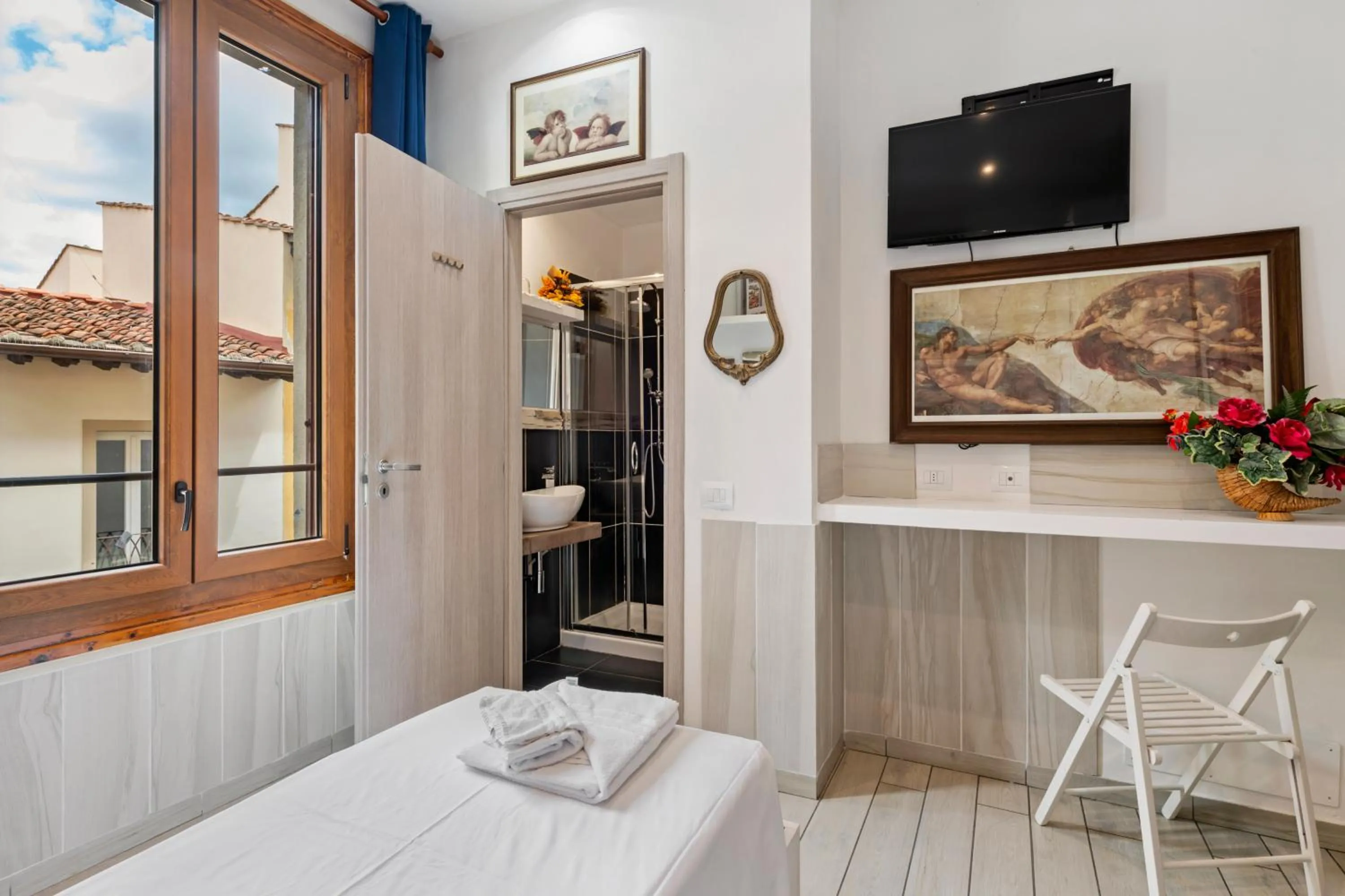 TV and multimedia, Bed in Guest House Biffi Simone