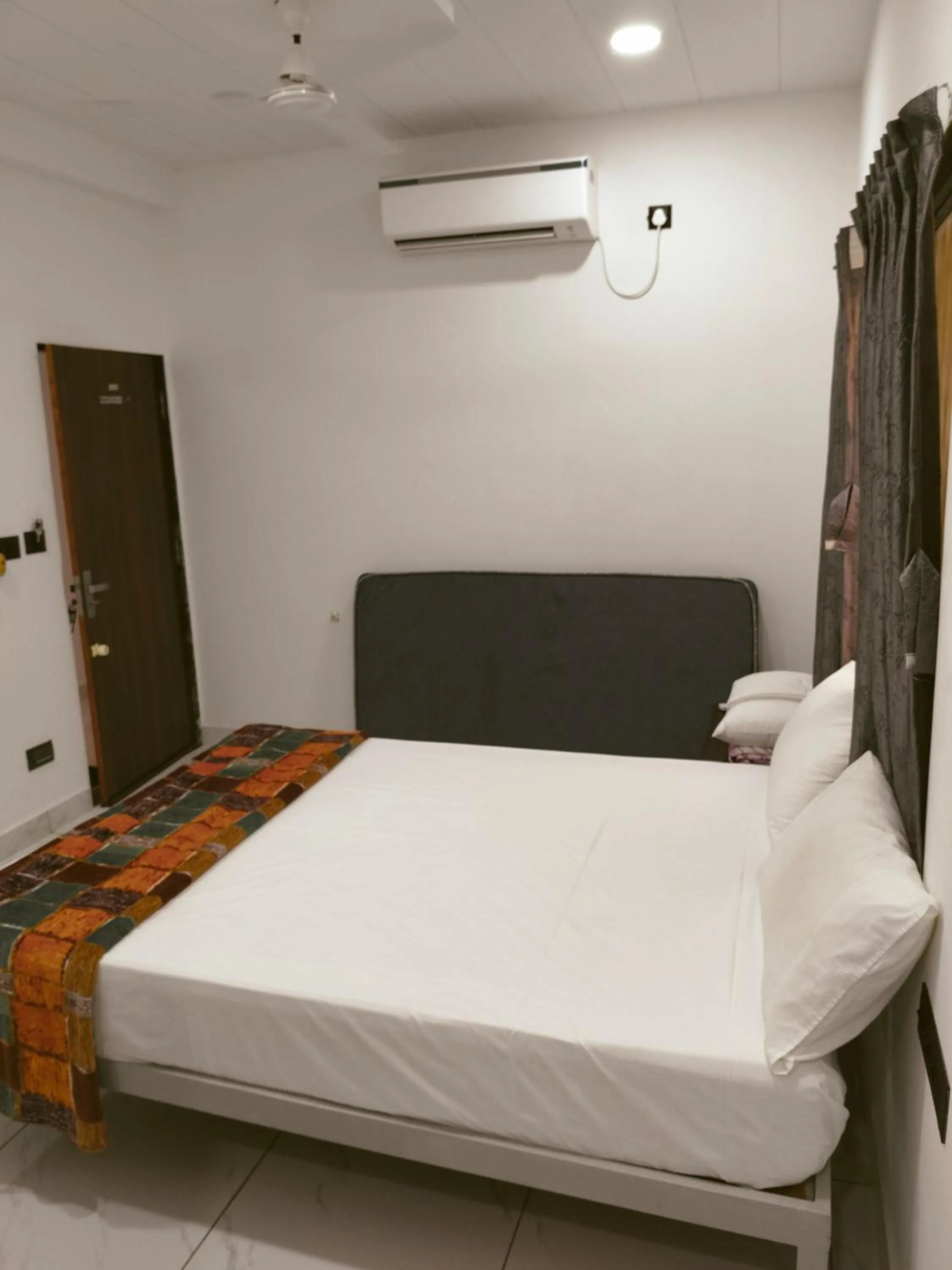 Bed in Gurukrupa Yatri Niwas