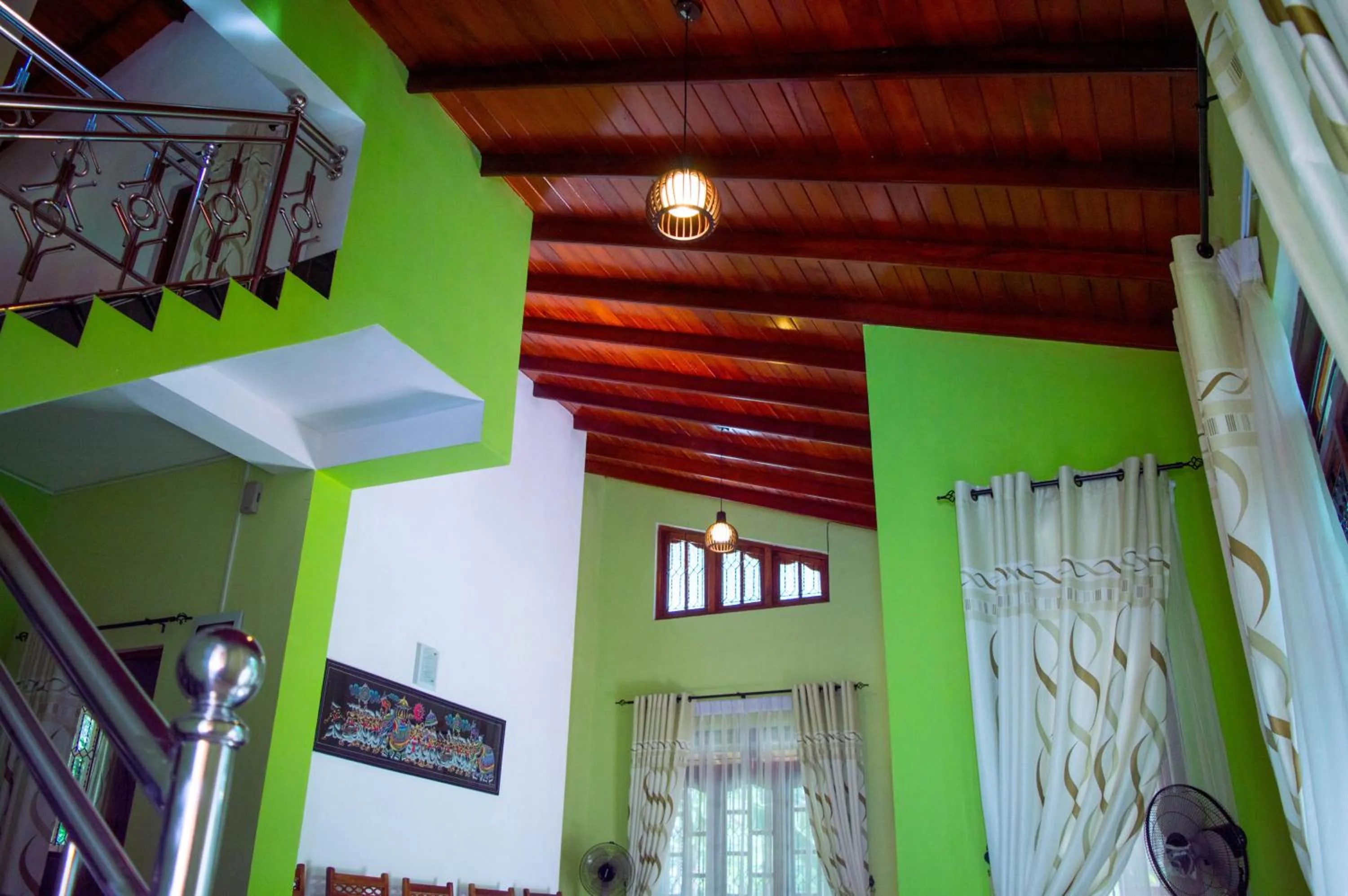 Communal lounge/ TV room in Binara Home Stay