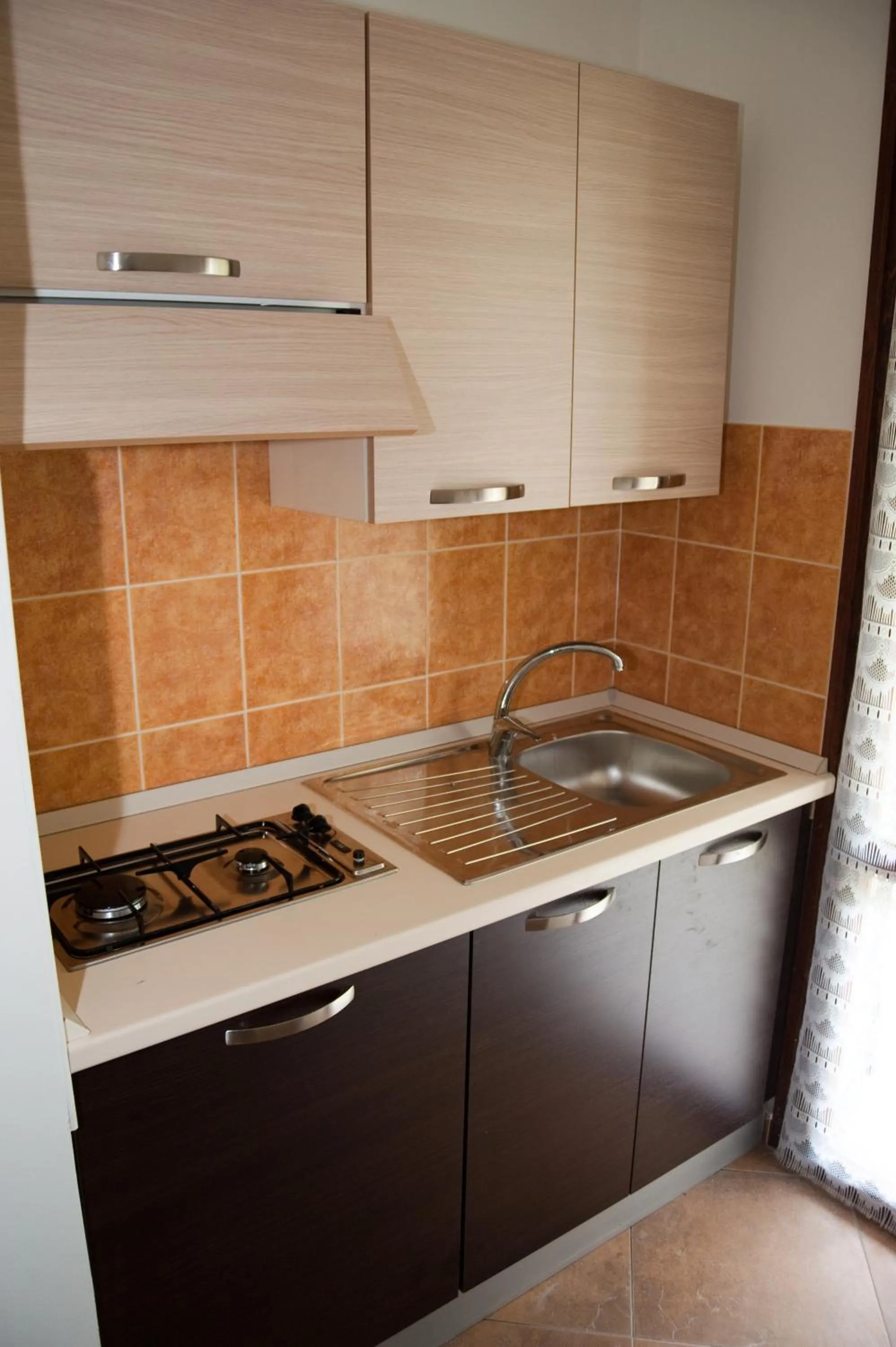 Kitchen or kitchenette in Residence Blu Marlin Natural free beach