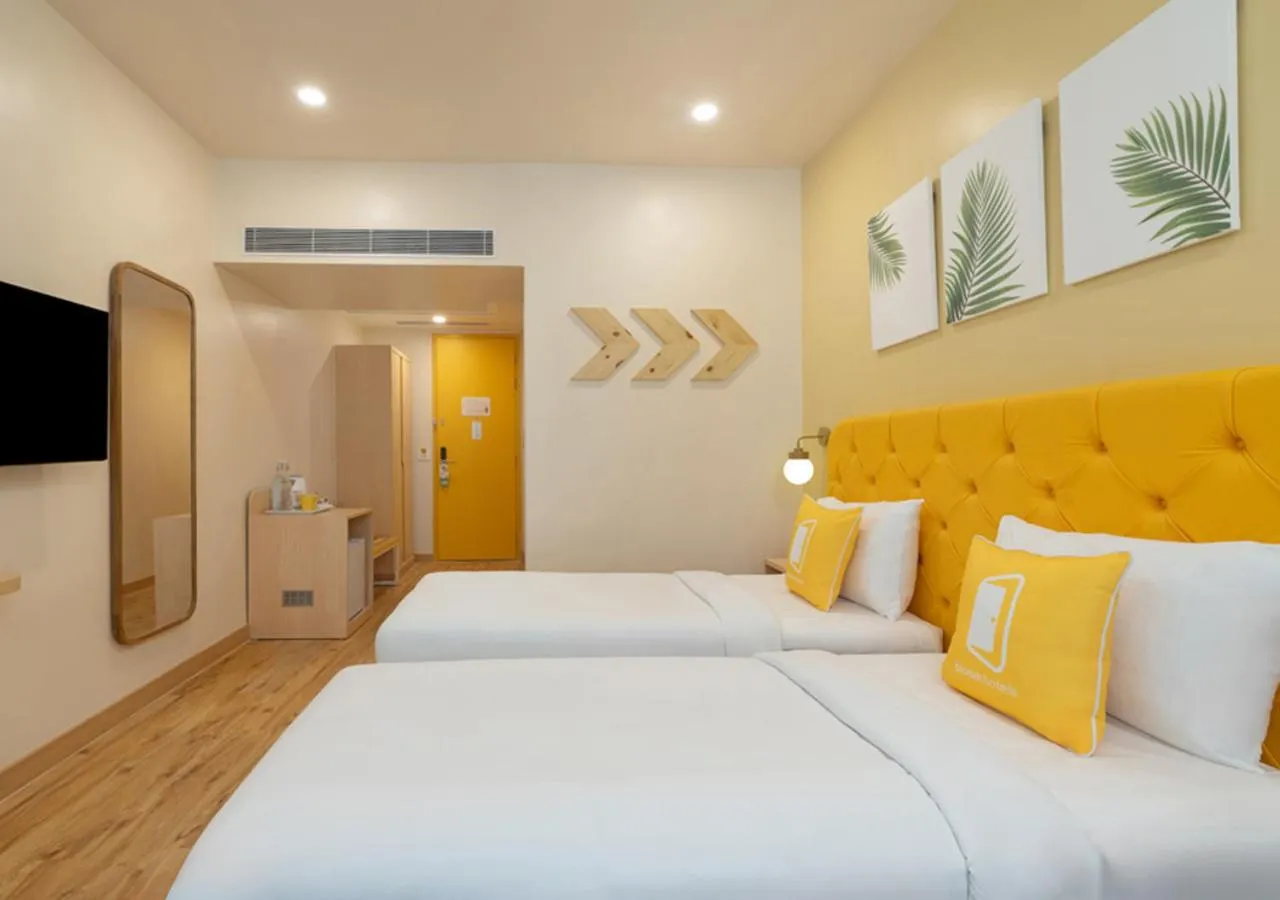 Bedroom, Bed in Bloom Hotel - DLF Road Gachibowli