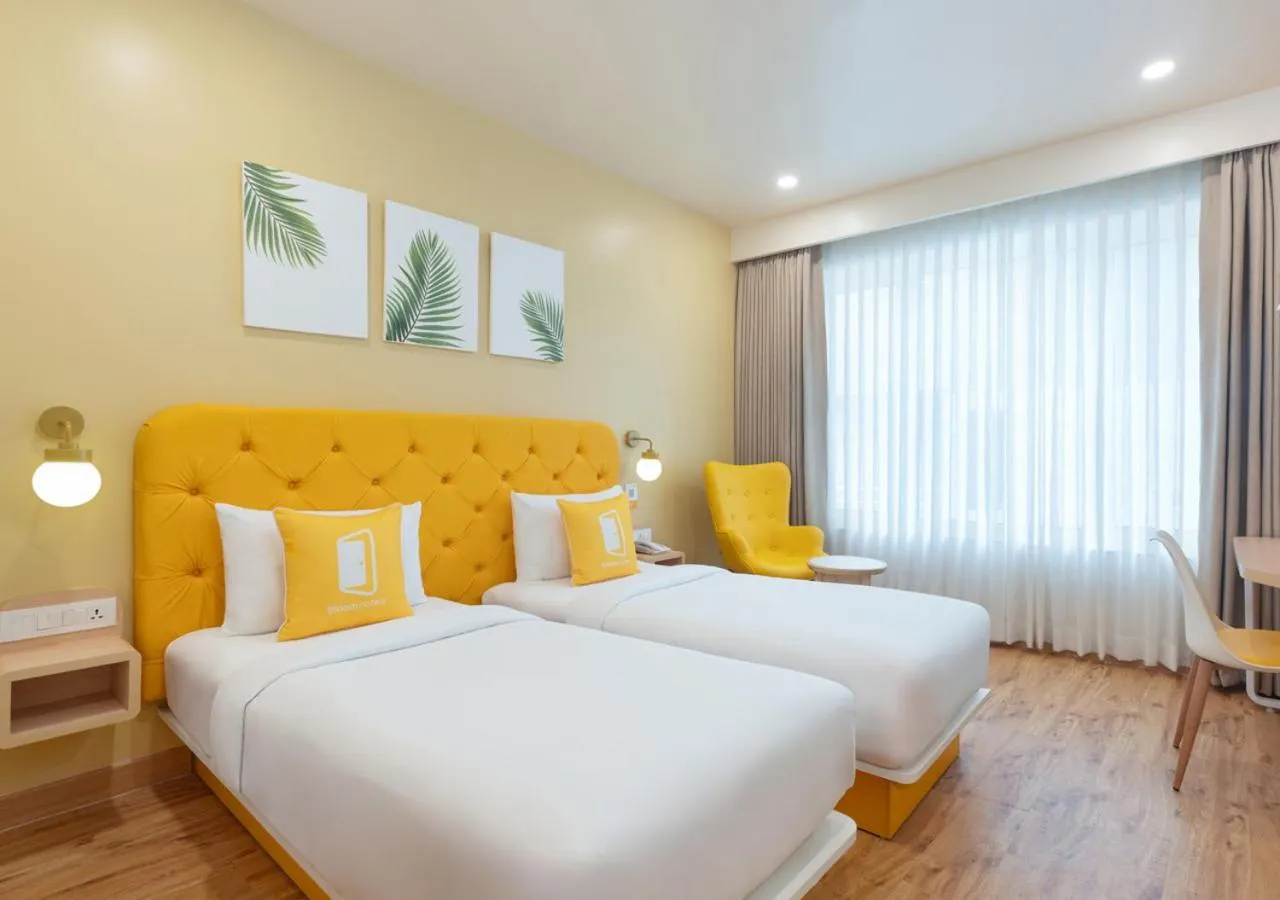 Bedroom, Bed in Bloom Hotel - DLF Road Gachibowli