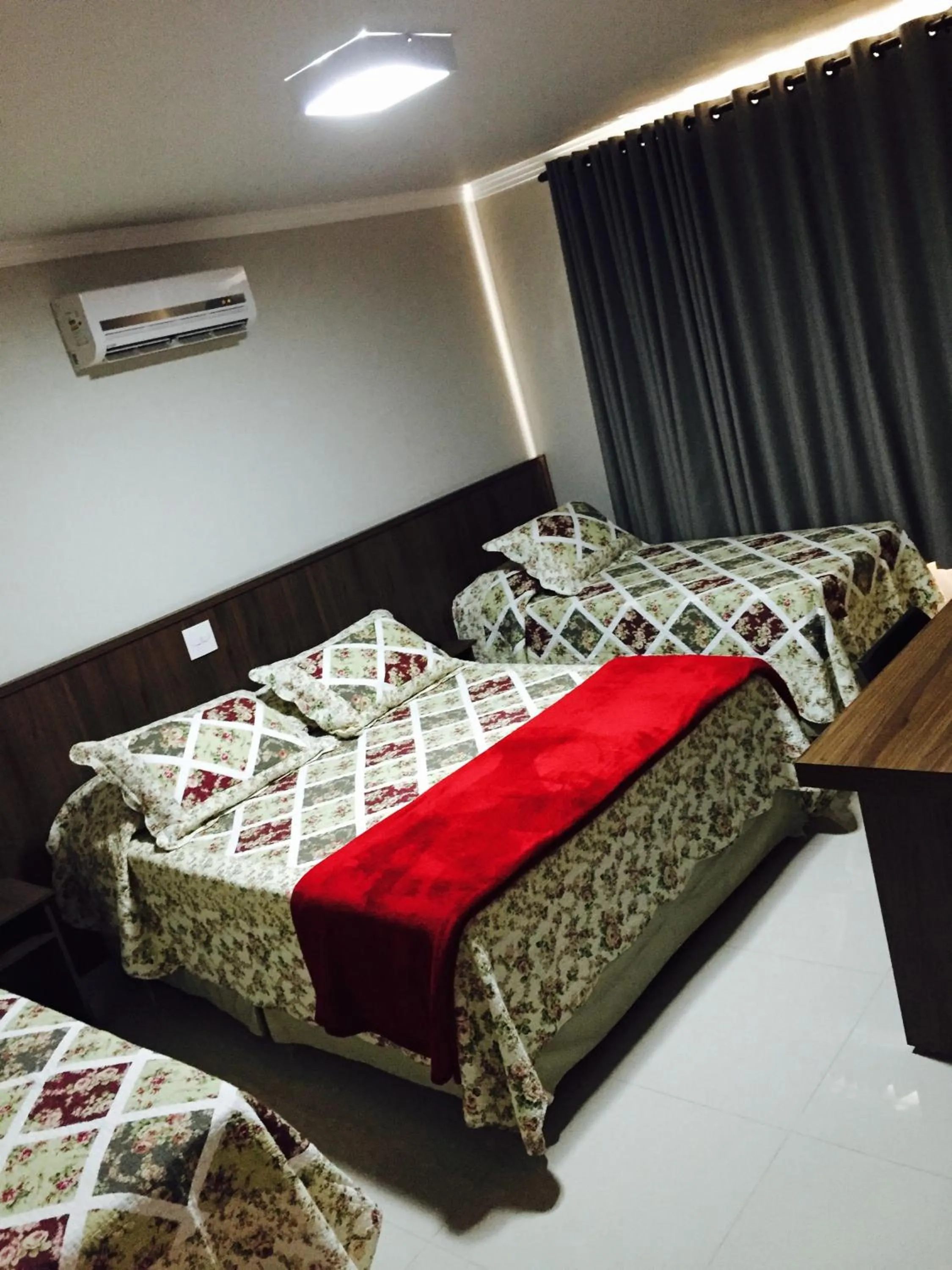 Photo of the whole room, Bed in JP Palace Hotel