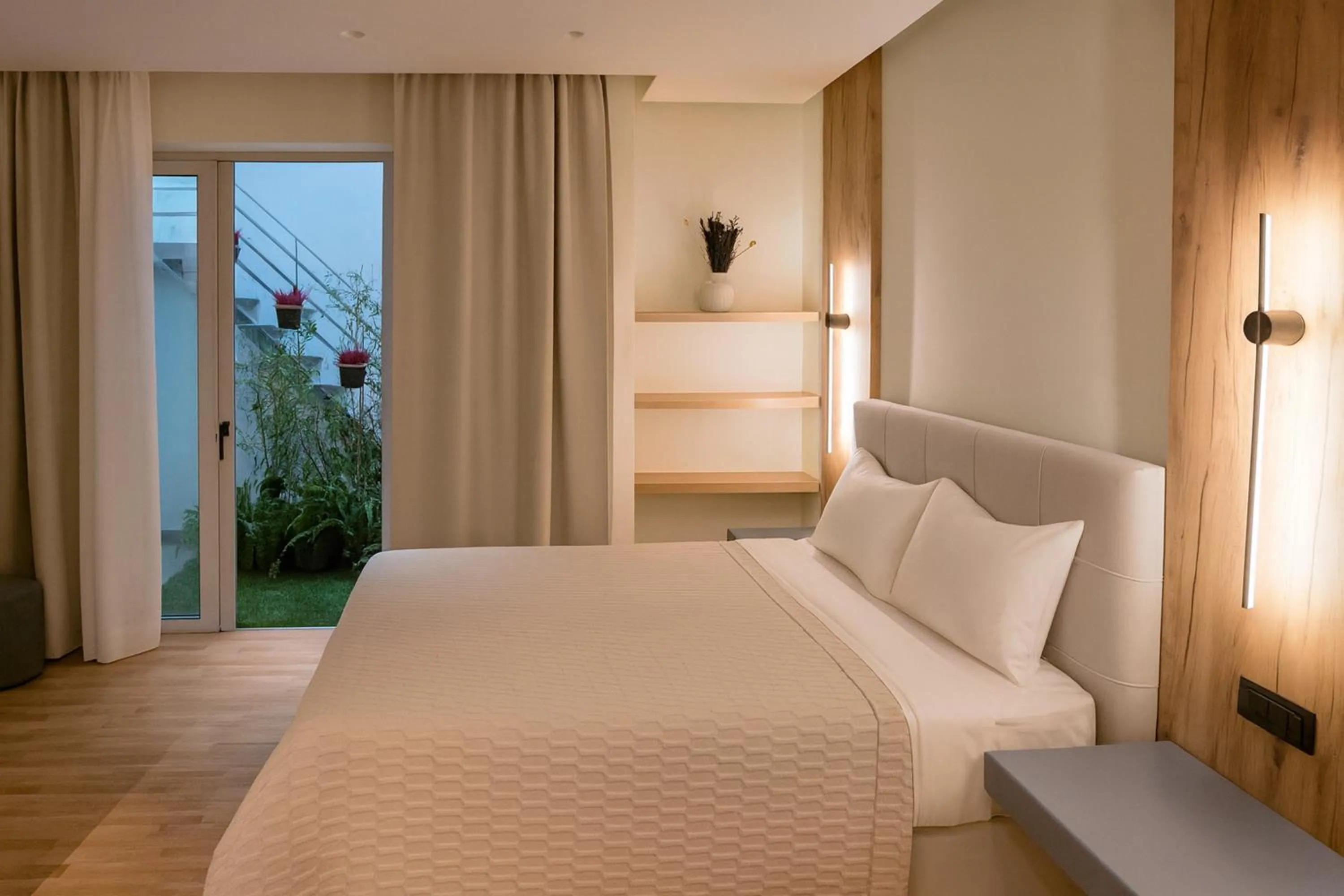 Bed in Elite Patras Suites