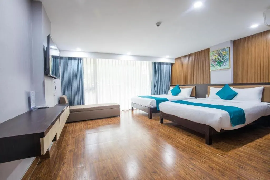 Bedroom, Bed in Blue Ocean Beachside Hotel Danang