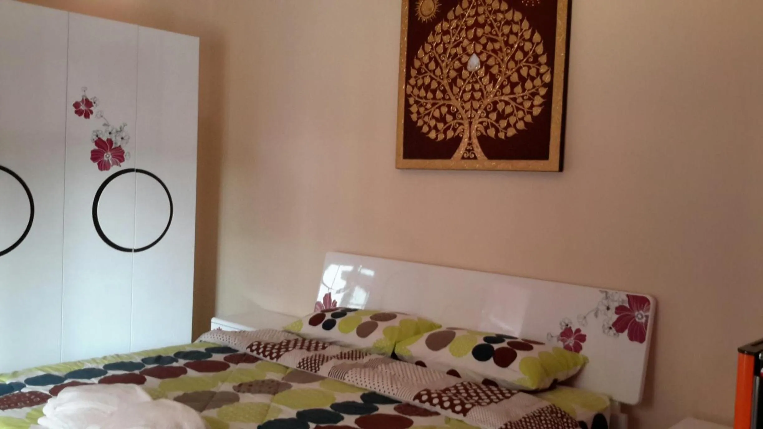 Bed in Donchai House Guest House& Cafe