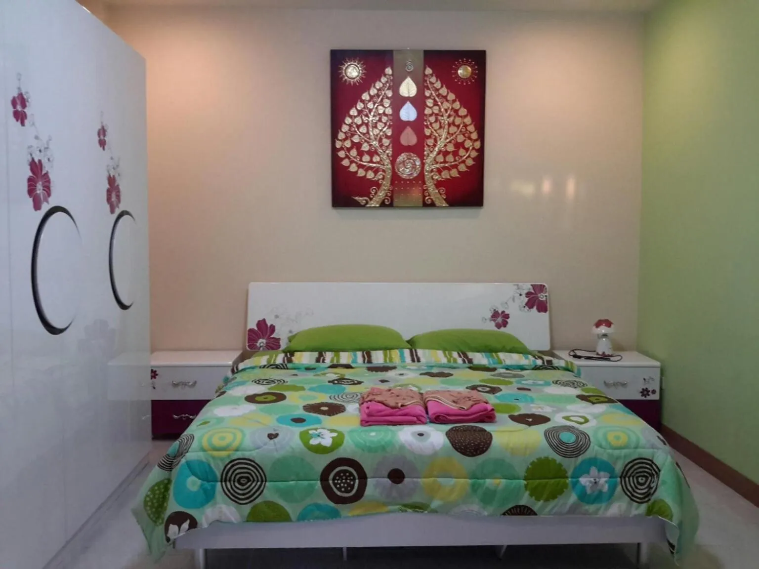 Bed in Donchai House Guest House& Cafe