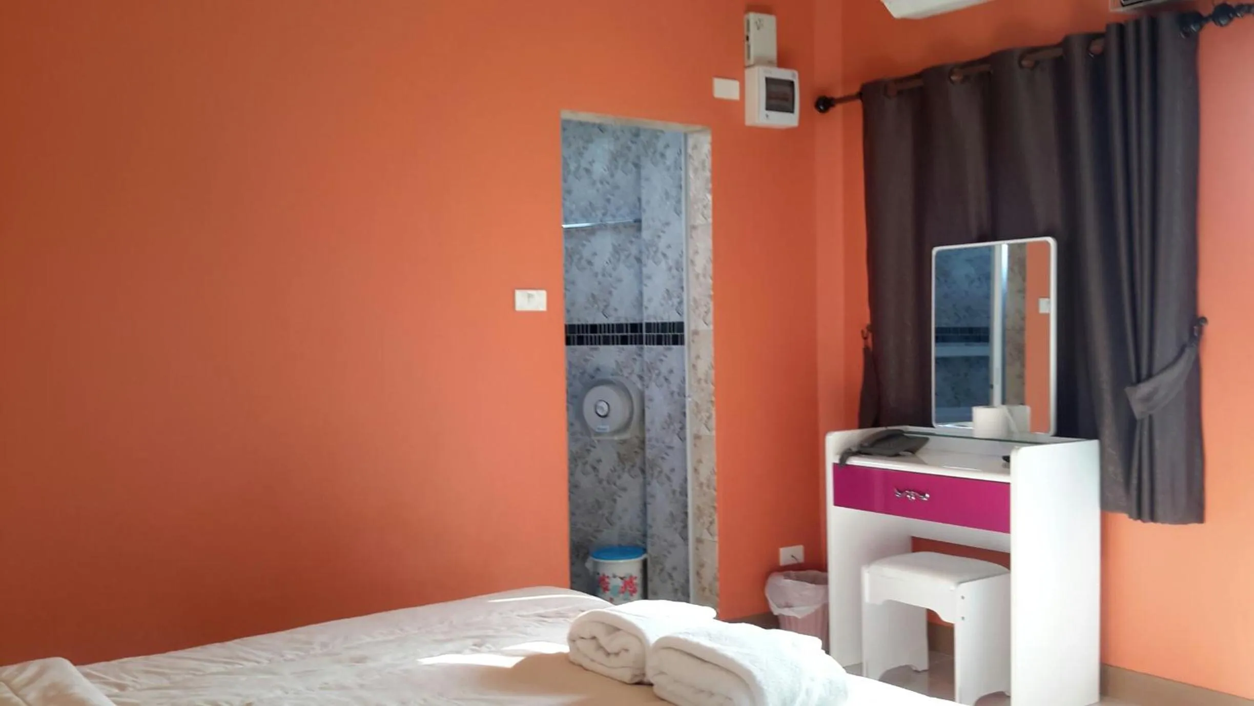 Bed in Donchai House Guest House& Cafe