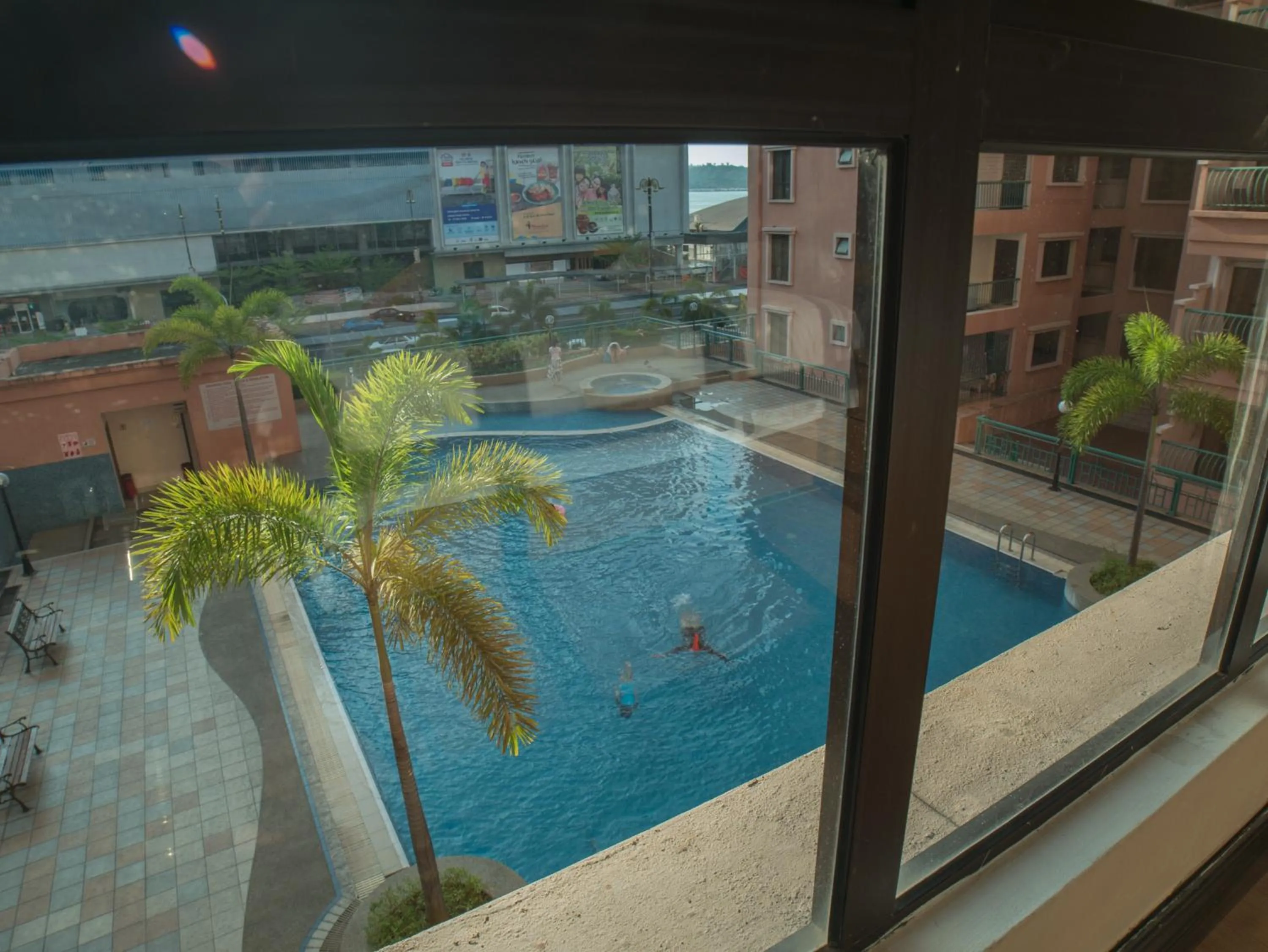 Pool view in KK Vacation Apartments-Marina Court - STAY AND GET CASH REBATE