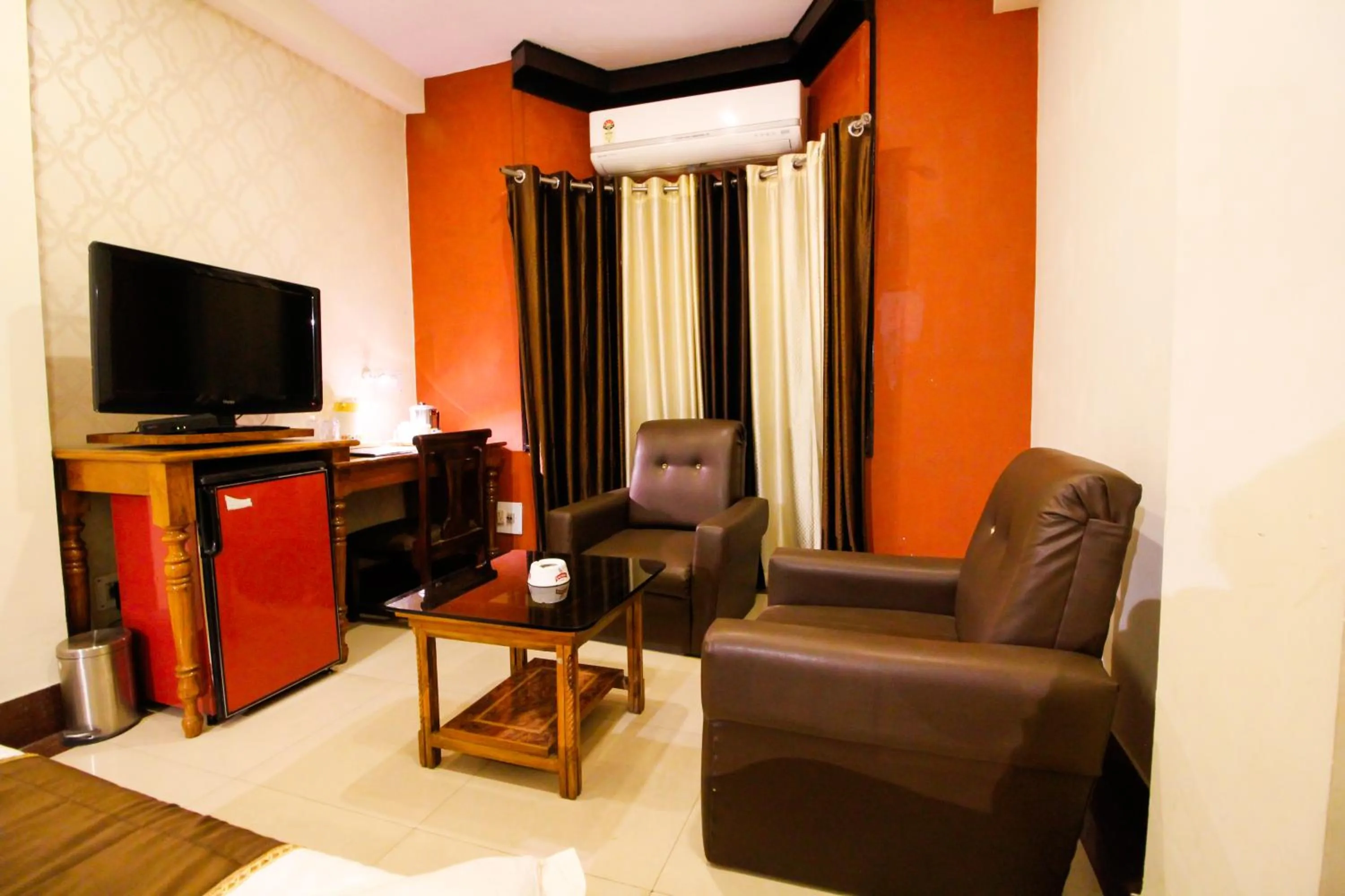 Living room in Hotel Rishi Regency