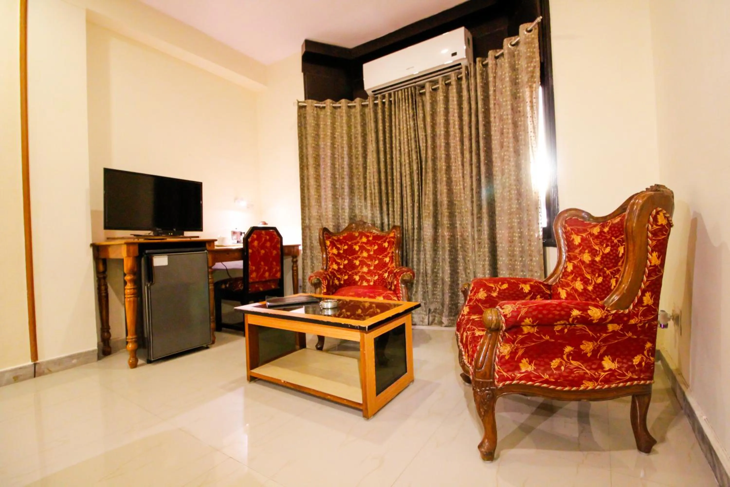 Living room in Hotel Rishi Regency