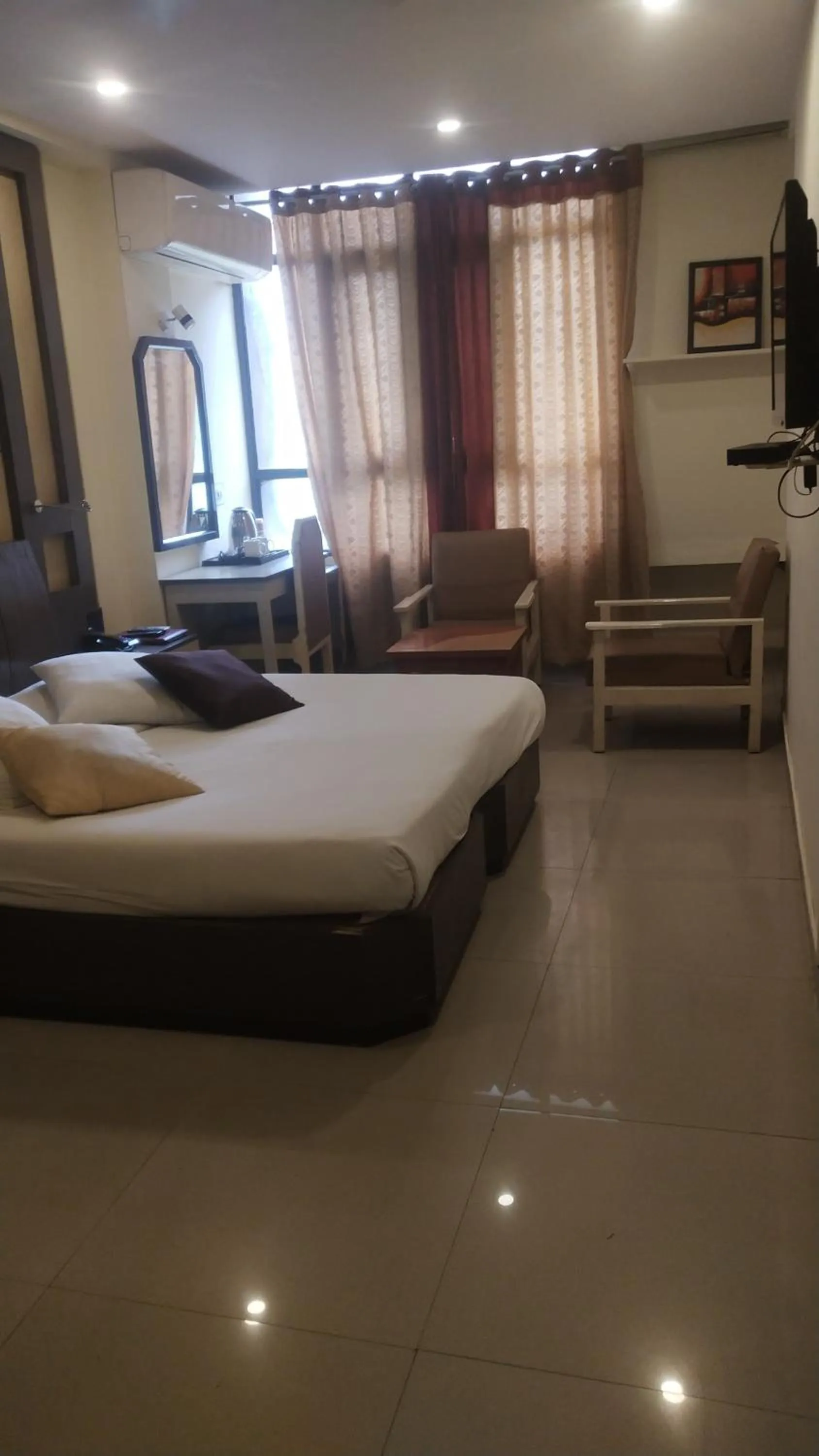Bed in Hotel Rishi Regency