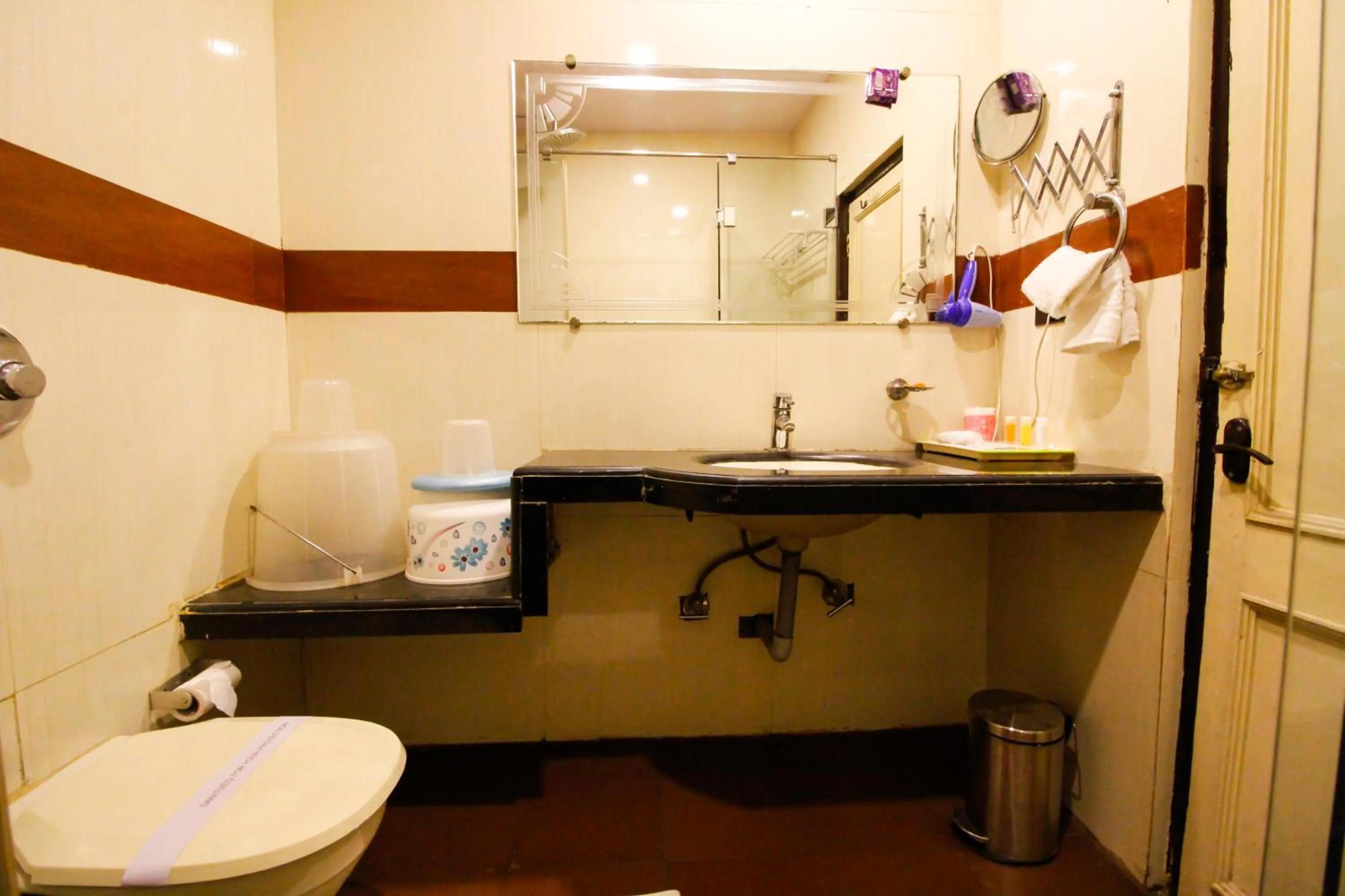 Bathroom in Hotel Rishi Regency