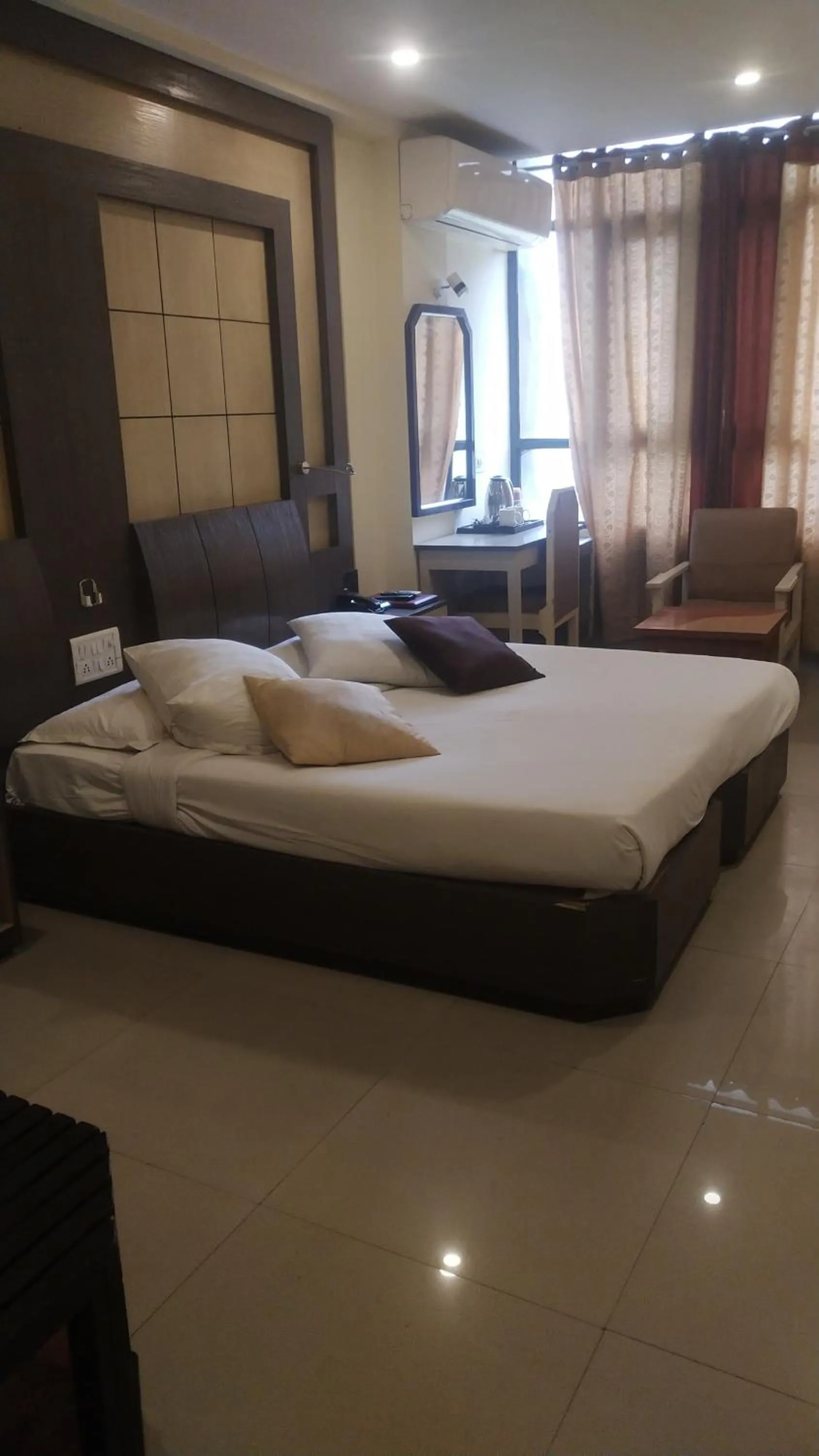 Bed in Hotel Rishi Regency