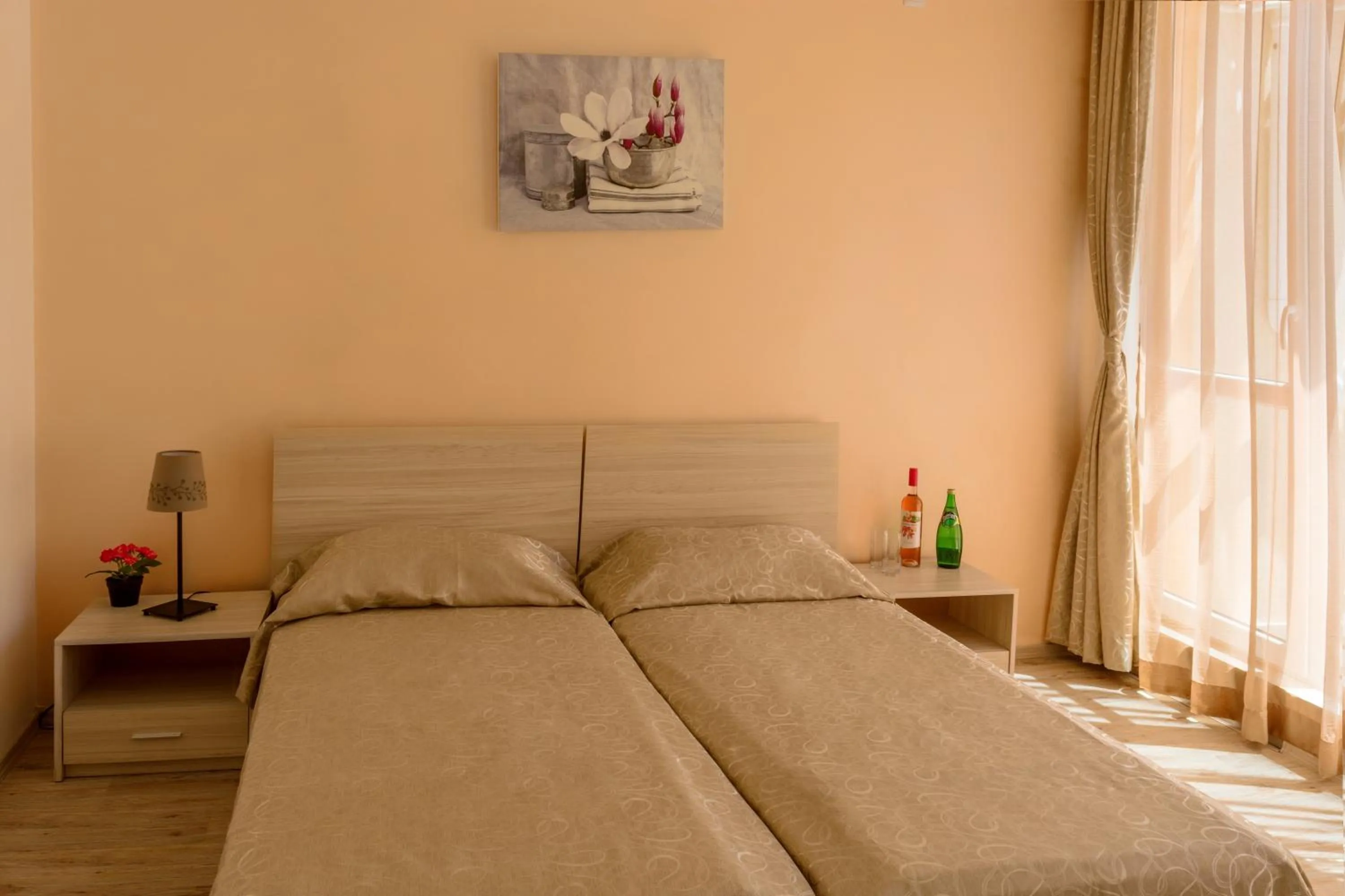 Bed in Vanilla Garden Apartments