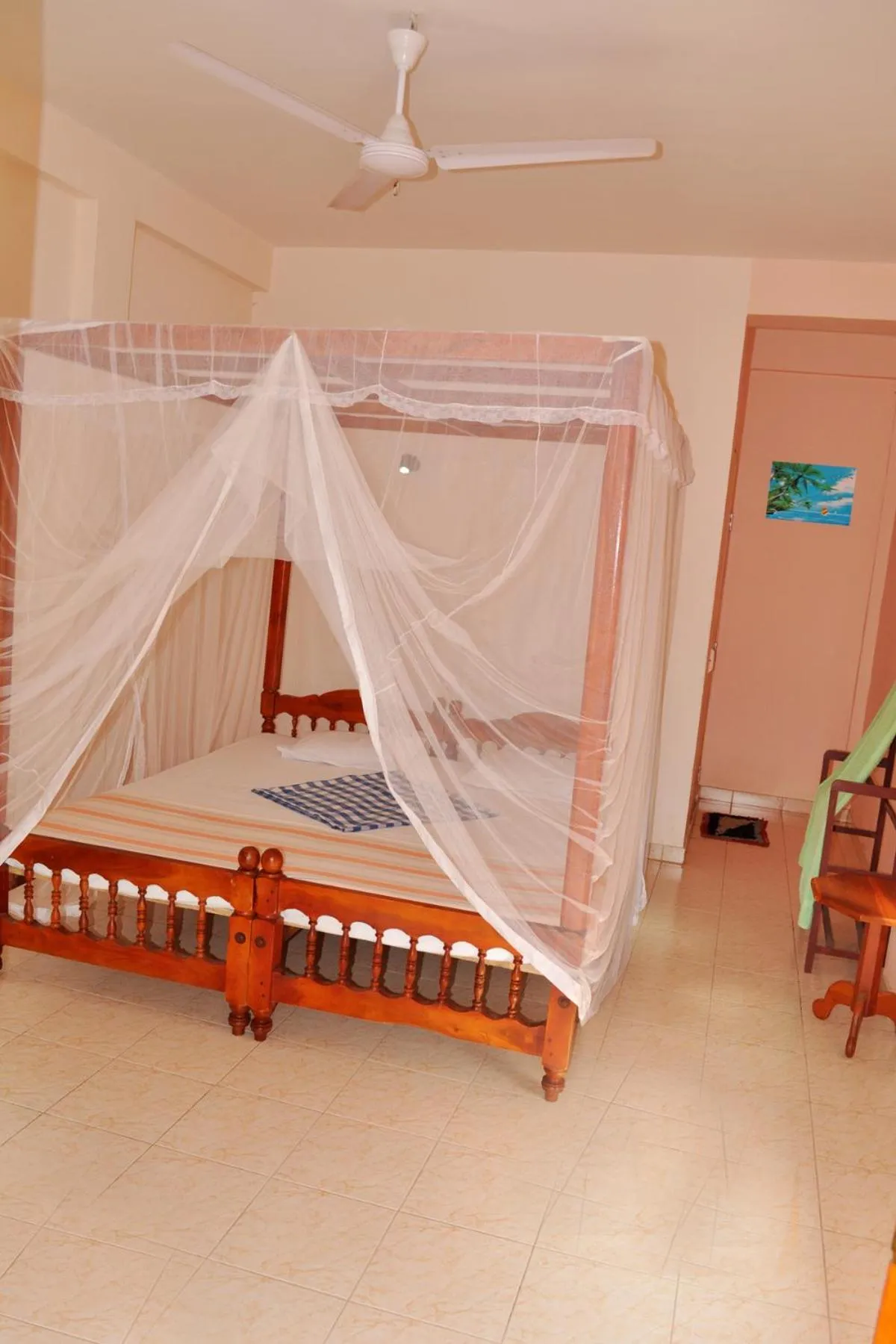 Photo of the whole room, Bed in Dilena Beach Inn