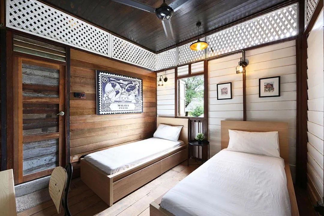 Bed in Bagas Zakariah Orchard Lodge