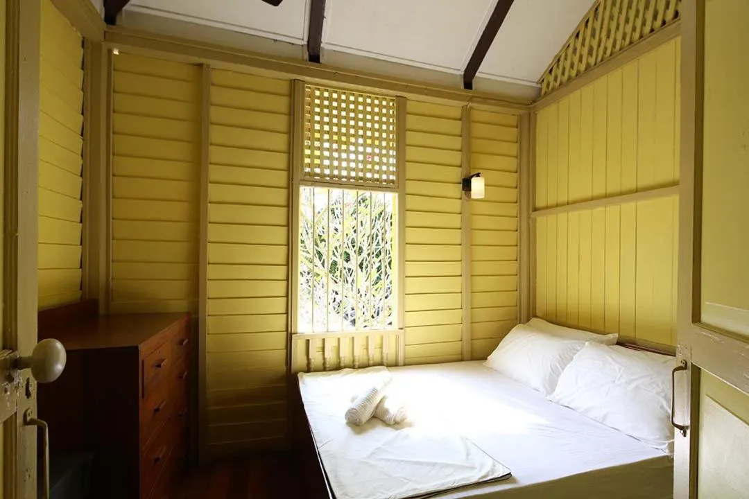 Bed in Bagas Zakariah Orchard Lodge