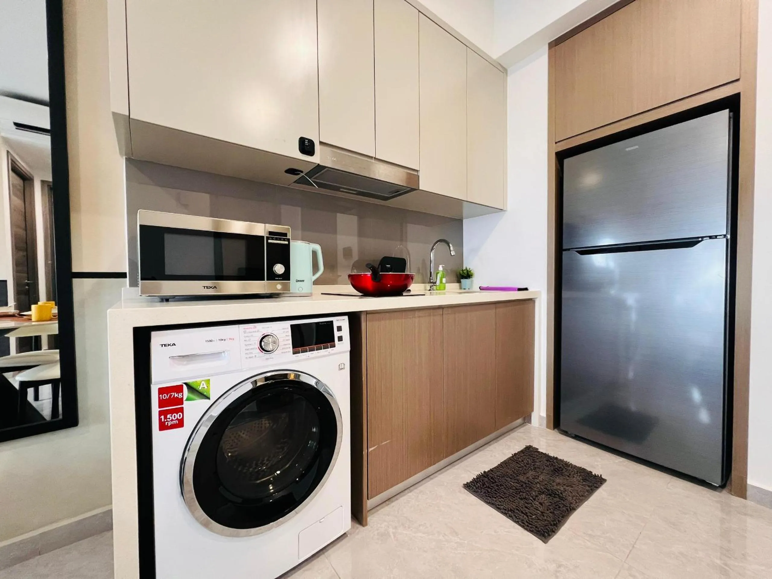 Kitchen or kitchenette in Agile Bukit Bintang by DeUrban