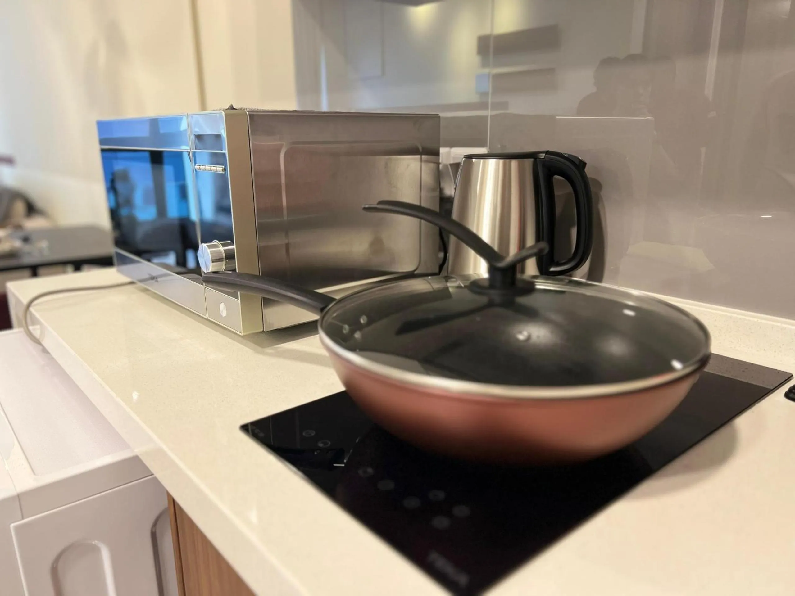 Kitchen or kitchenette in Agile Bukit Bintang by DeUrban