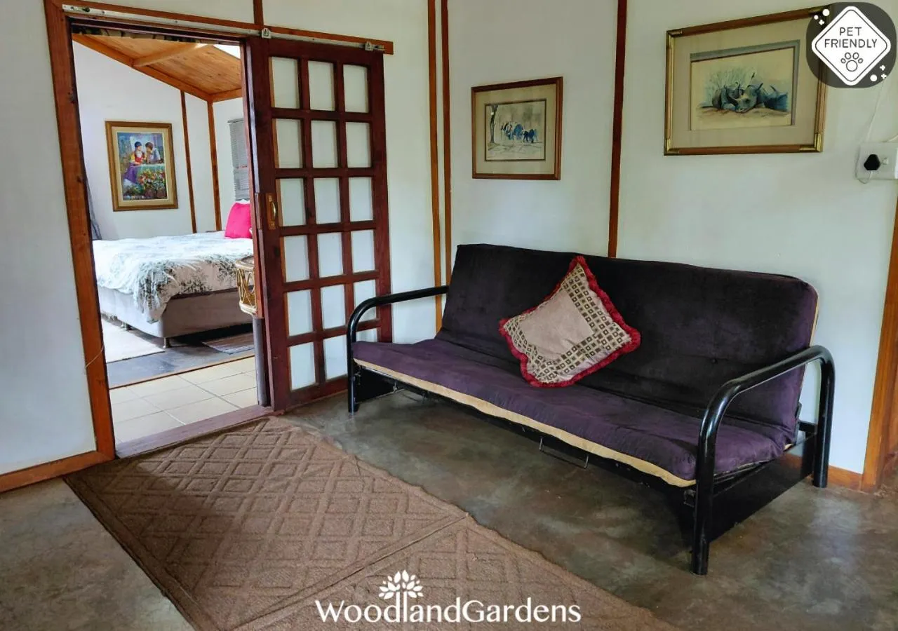 Living room, Bed in Woodland Gardens Self catering Pet Friendly Lodge