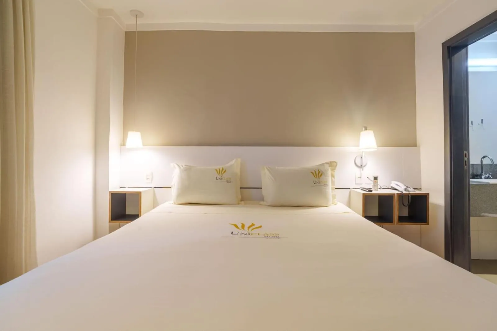 Bed in Uniclass Hotel Pinheiros