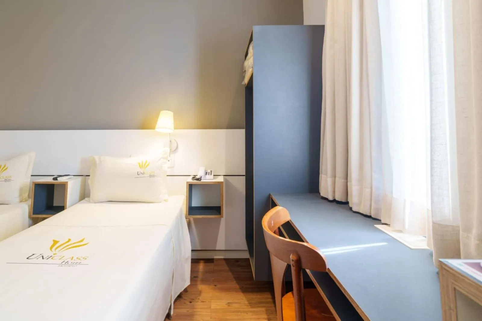 Bed in Uniclass Hotel Pinheiros