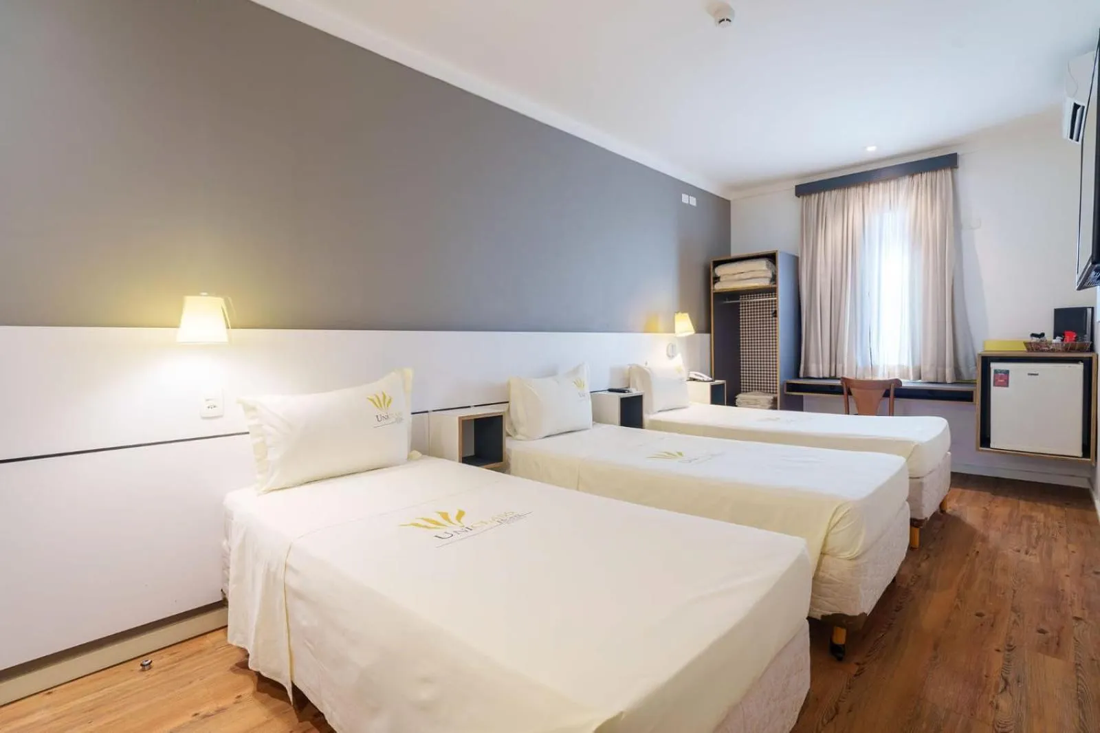 Bed in Uniclass Hotel Pinheiros