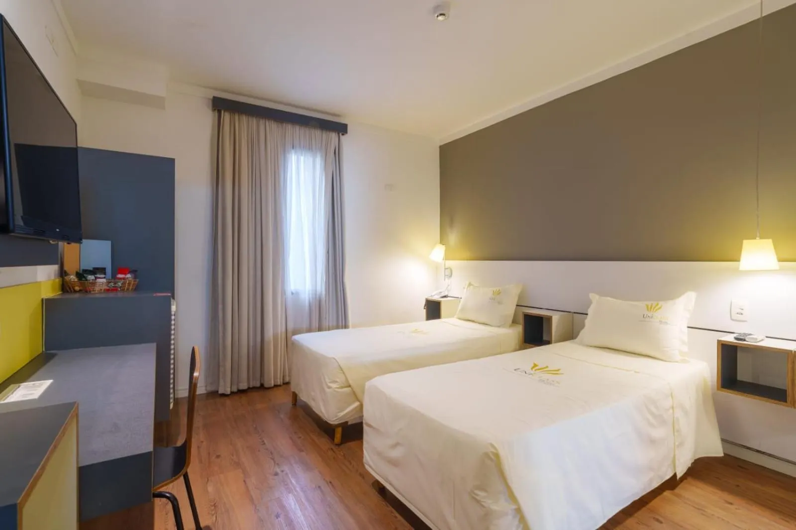 Bed in Uniclass Hotel Pinheiros