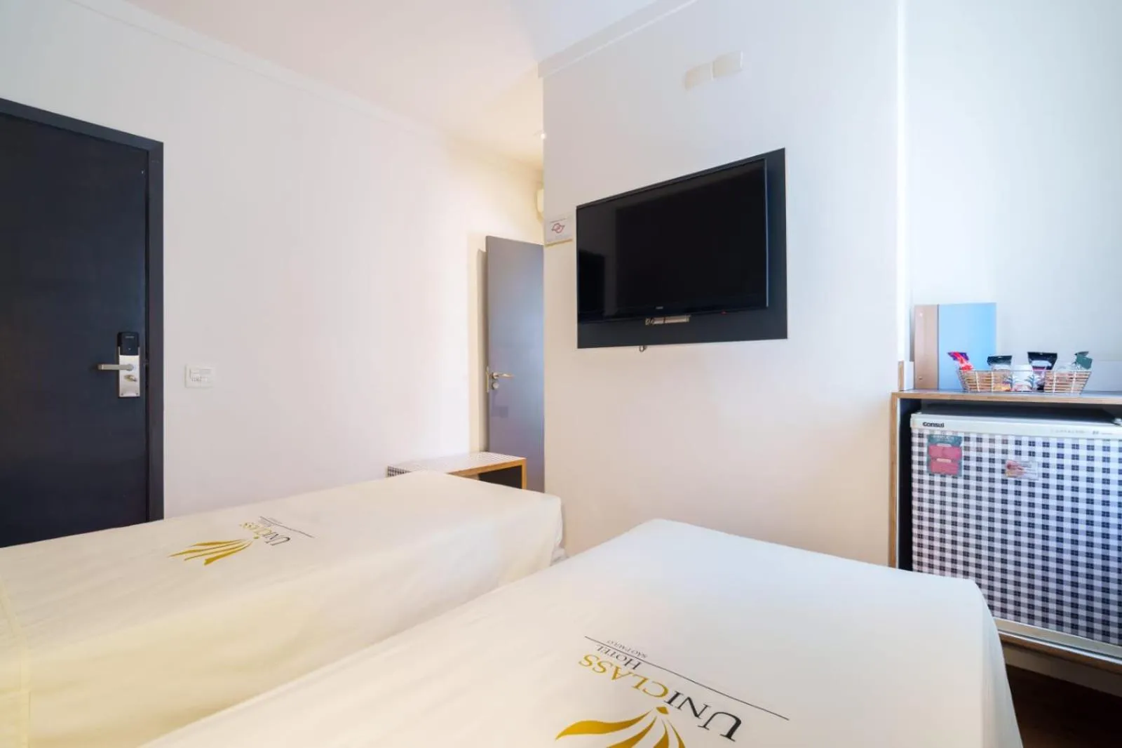 Bed in Uniclass Hotel Pinheiros