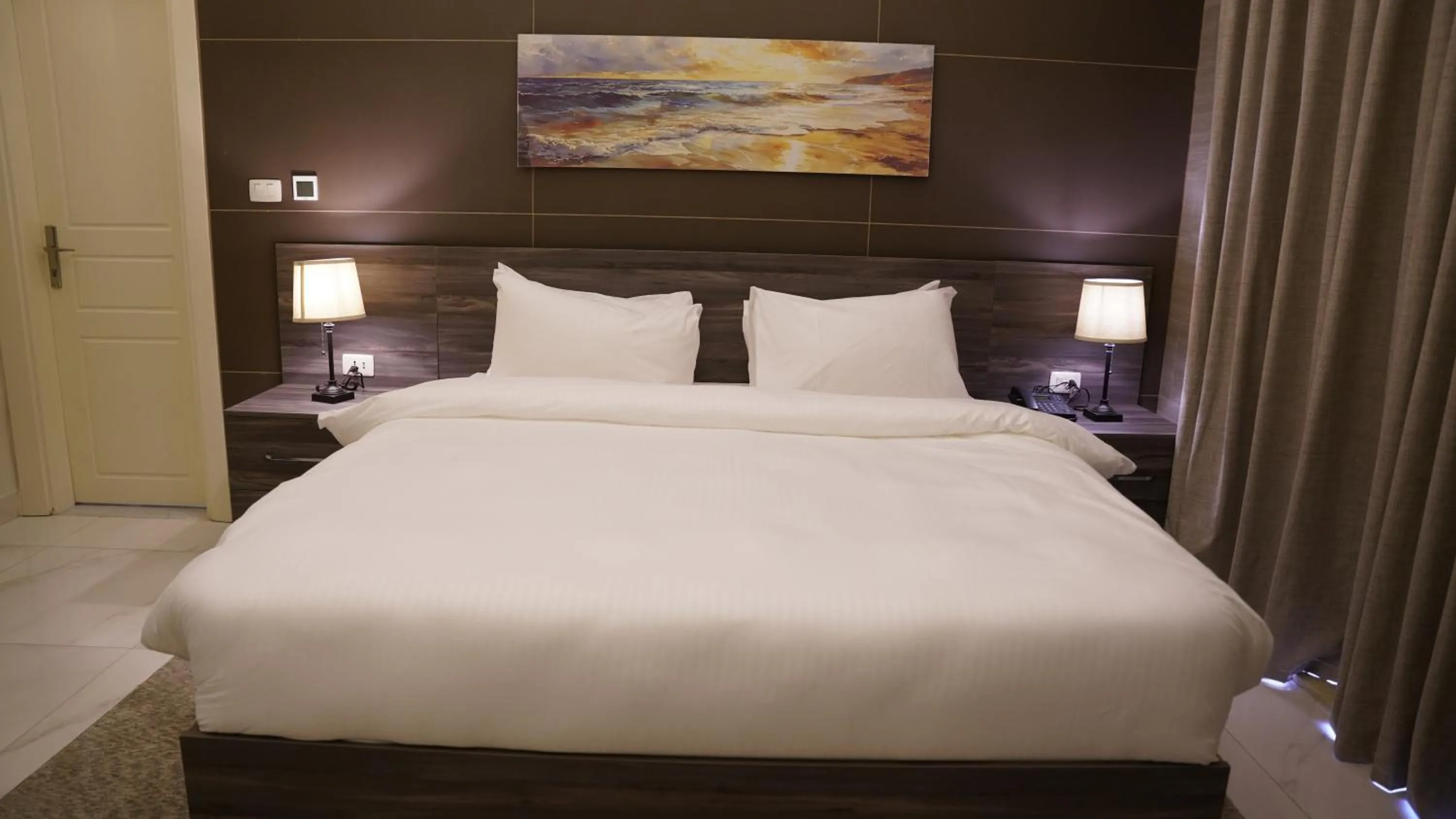 Bed in Sukoon Hotel Amman