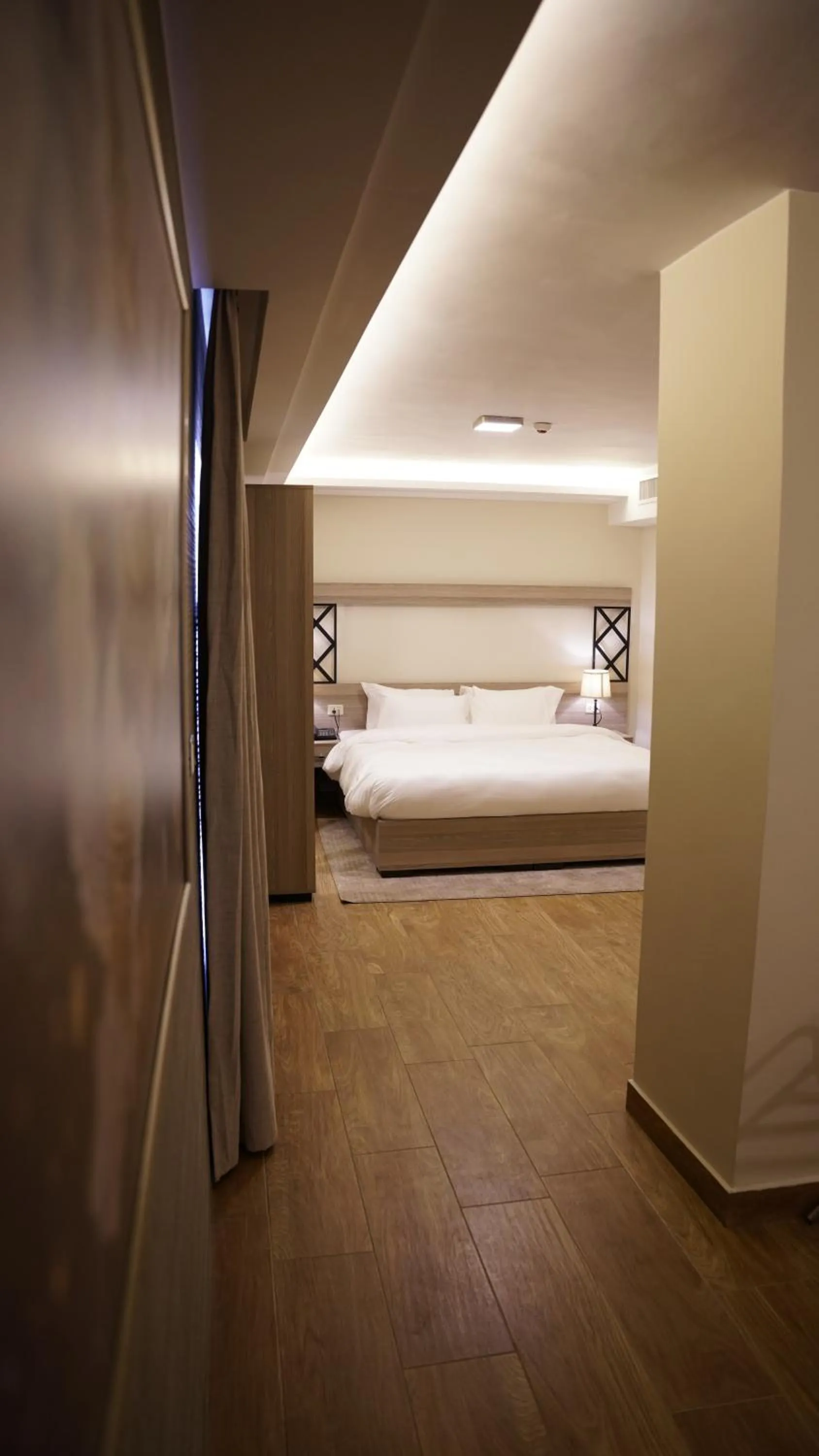 Bed in Sukoon Hotel Amman