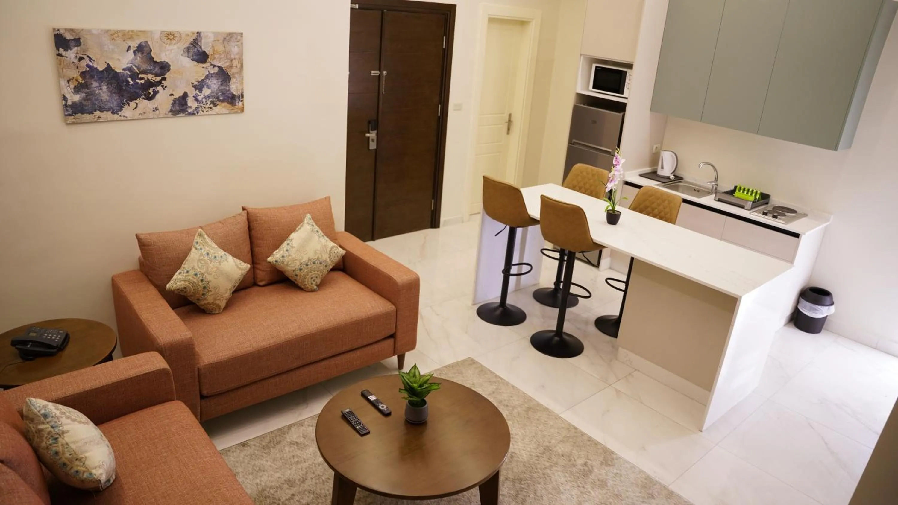 Kitchen or kitchenette in Sukoon Hotel Amman