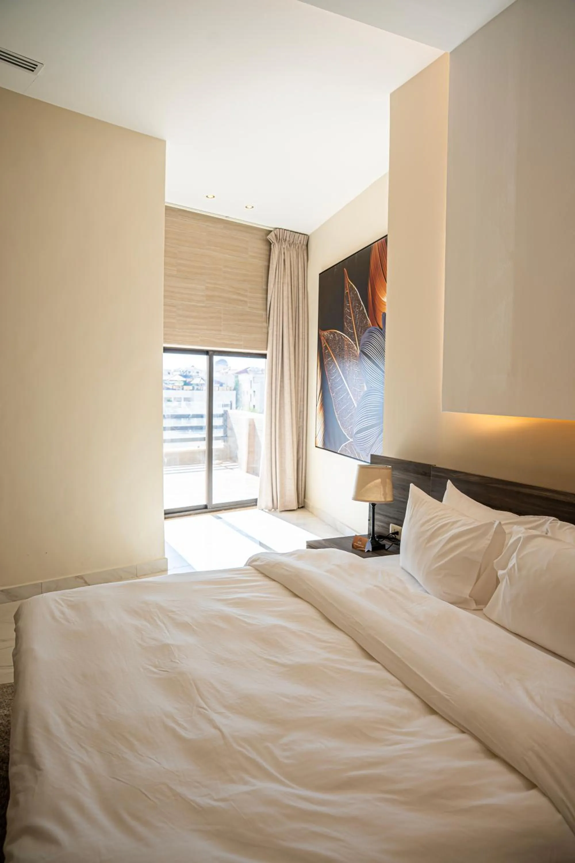 Bed in Sukoon Hotel Amman