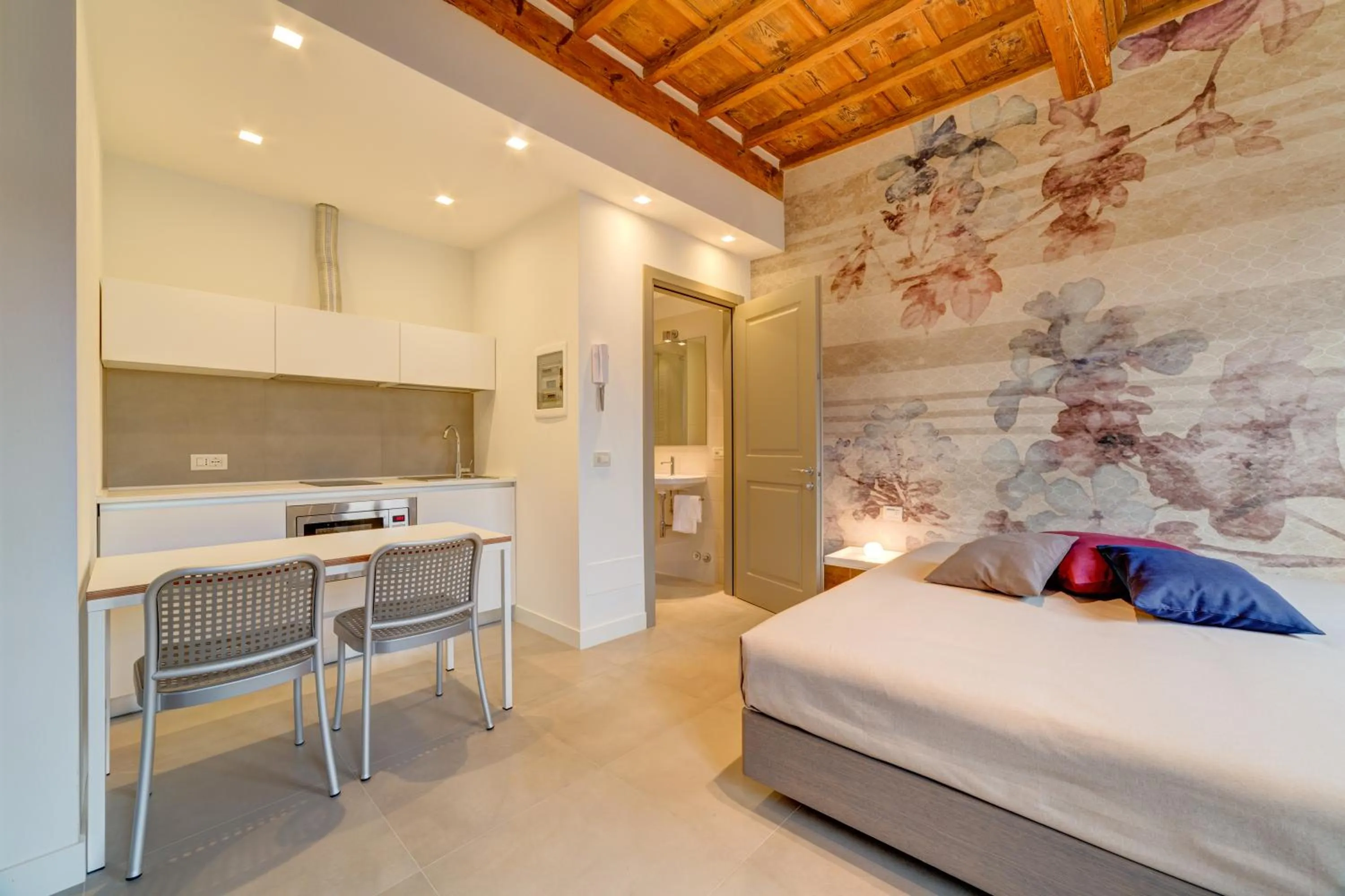 Bed in Palazzo Mannaioni Suites