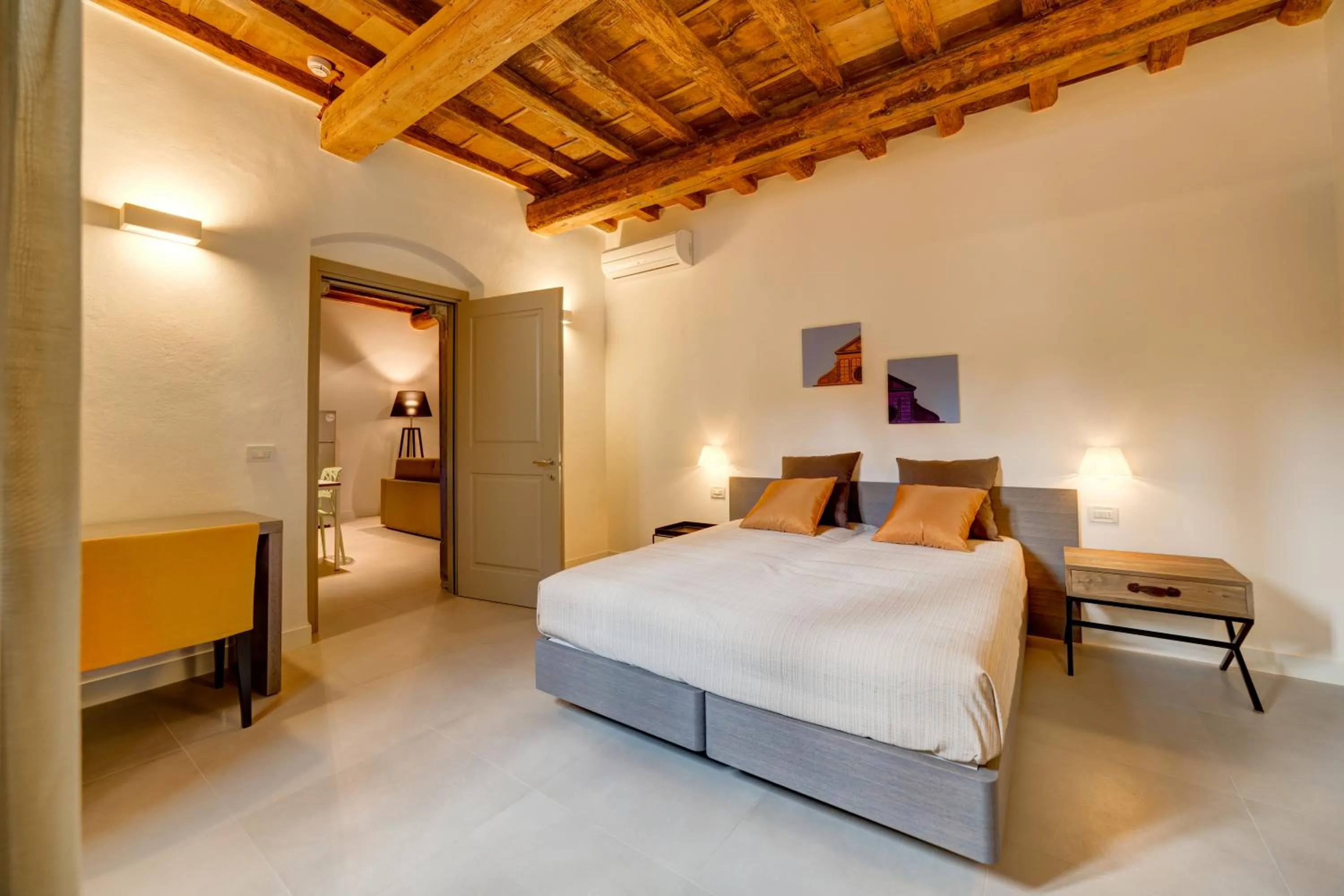 Bed in Palazzo Mannaioni Suites