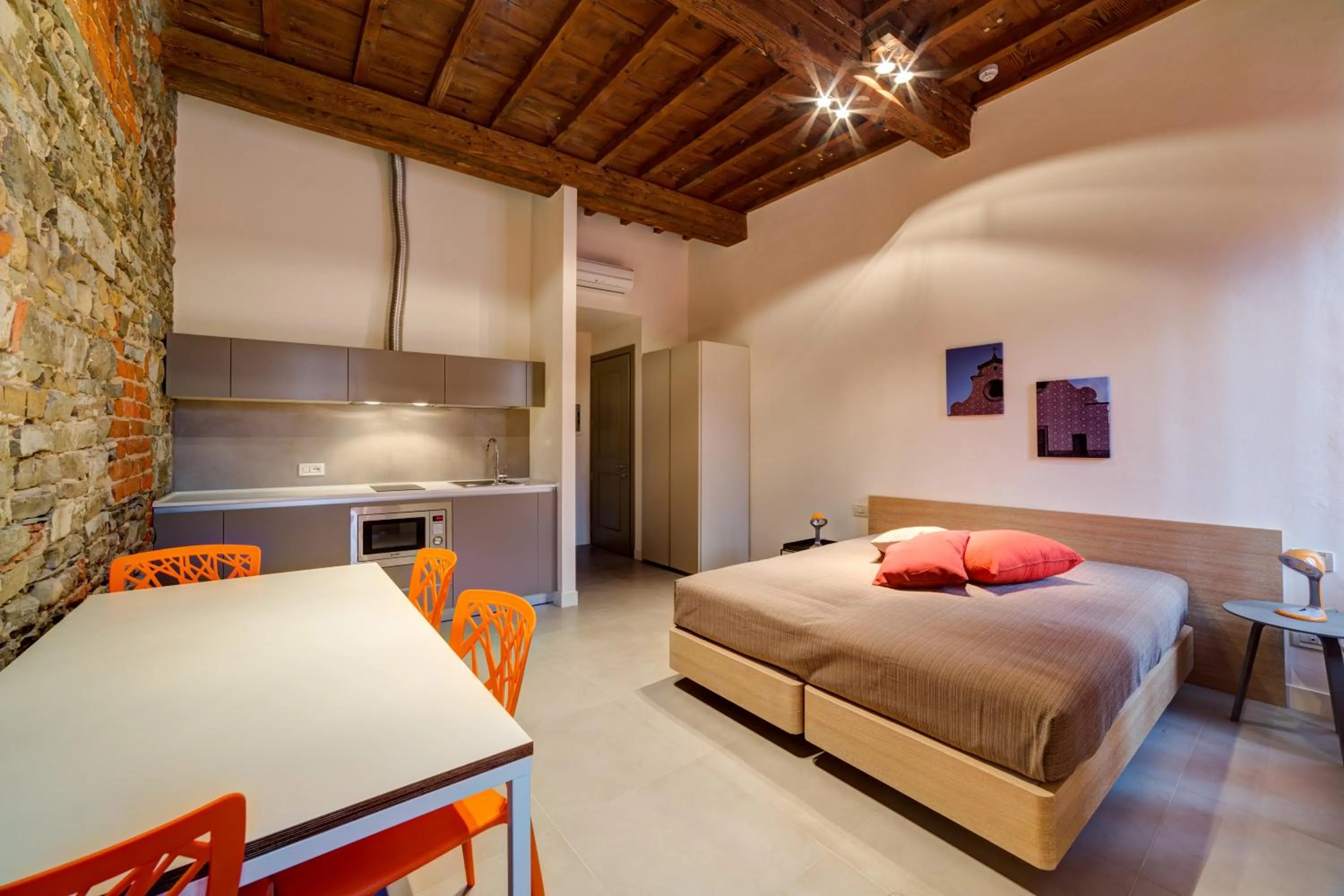 Bed in Palazzo Mannaioni Suites