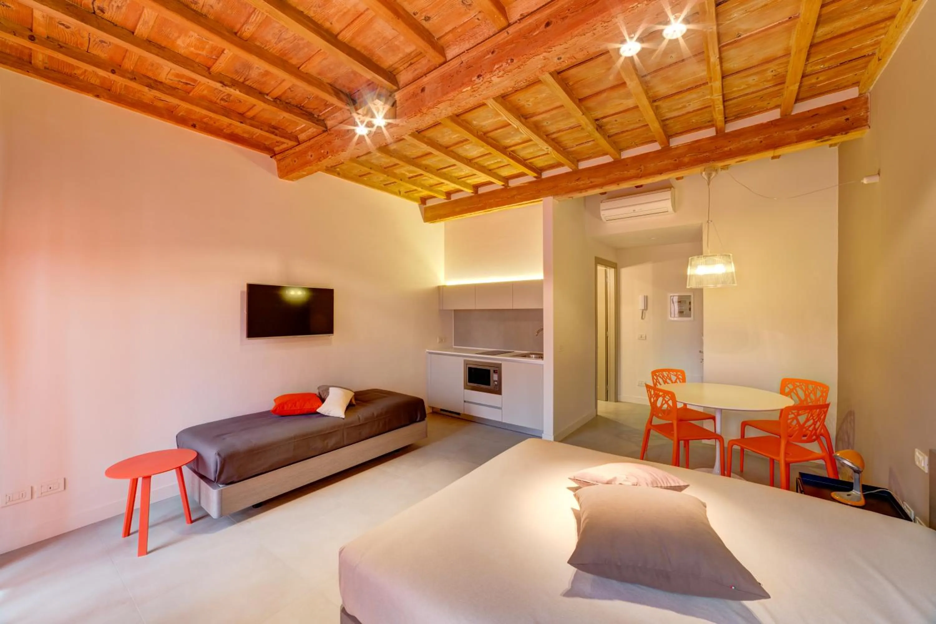 Bed in Palazzo Mannaioni Suites