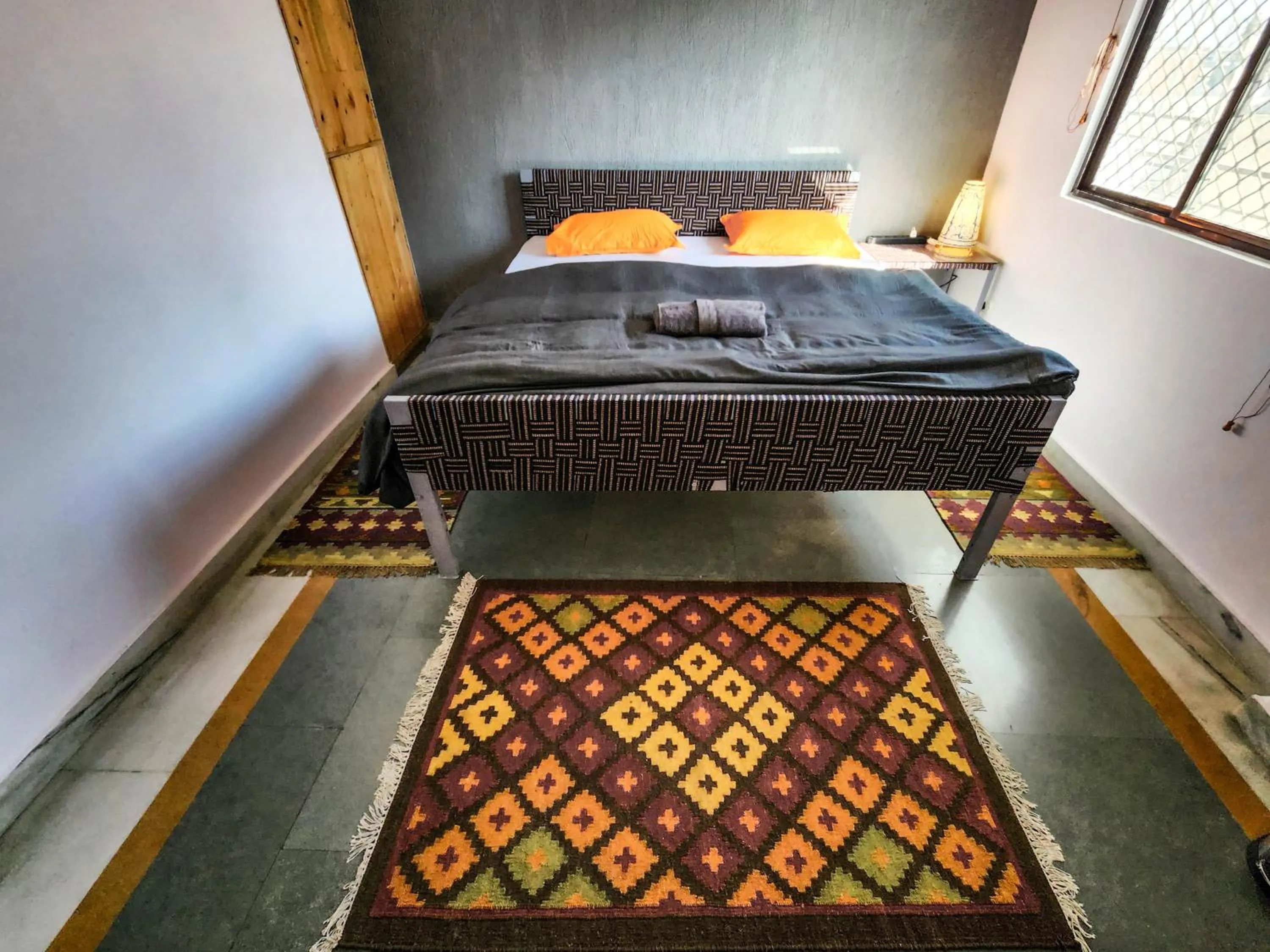 Bed in JHouse near Bhikaji